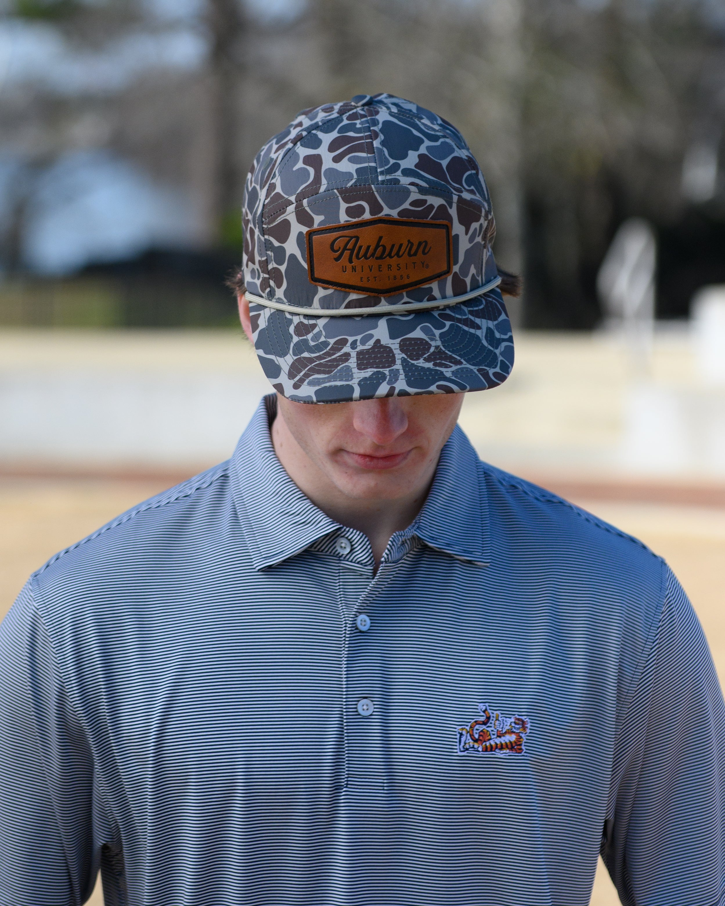 Auburn University Auburn Leather Patch Hat Duck Camo JNJ 7-Panel Hat with White rope and Leather patch with text "Auburn University"