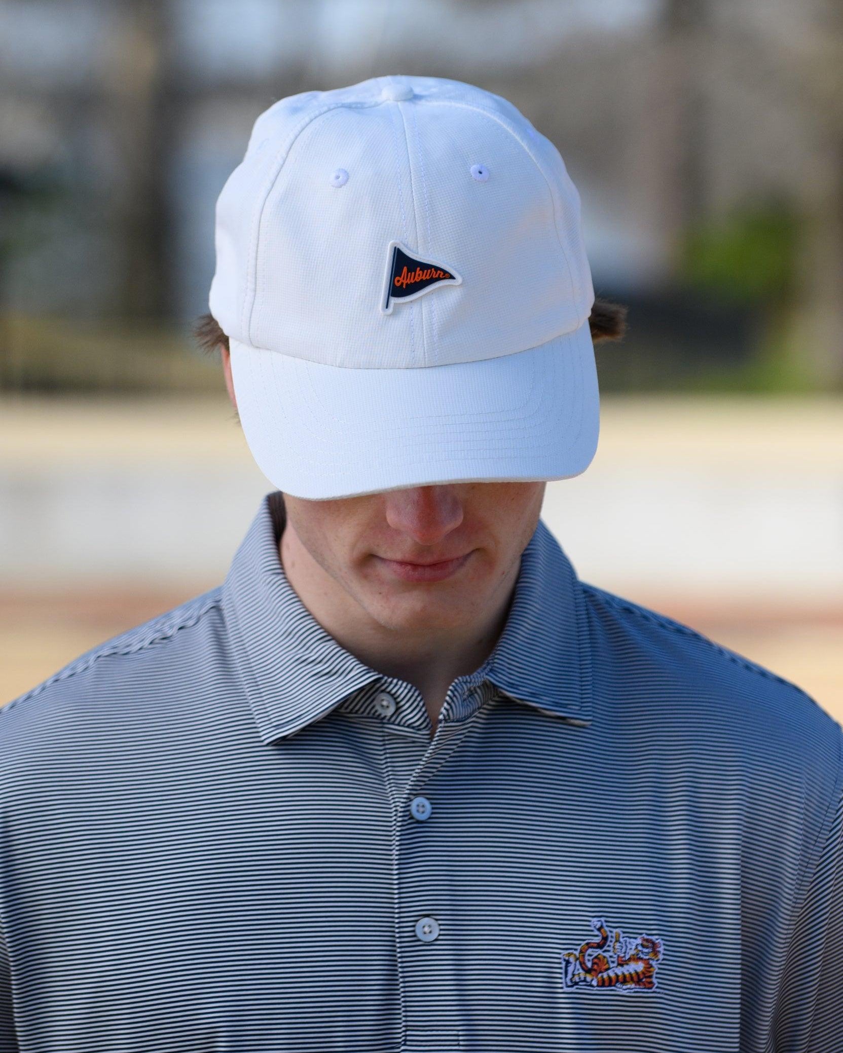 Auburn University White Hat featuring a Navy pennant flag patch with Orange script “Auburn”