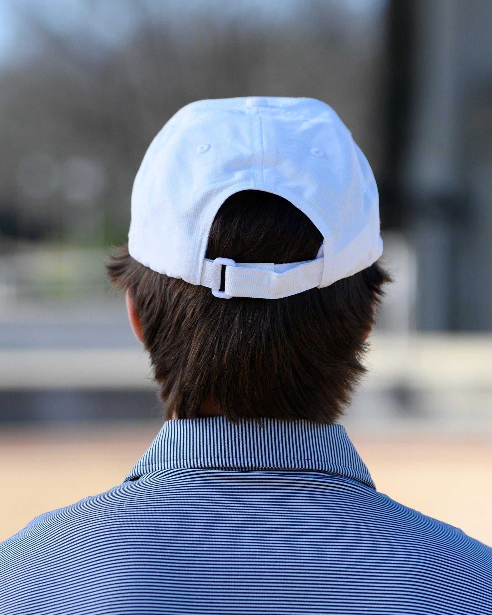 Auburn University White Hat featuring a Navy pennant flag patch with Orange script “Auburn”