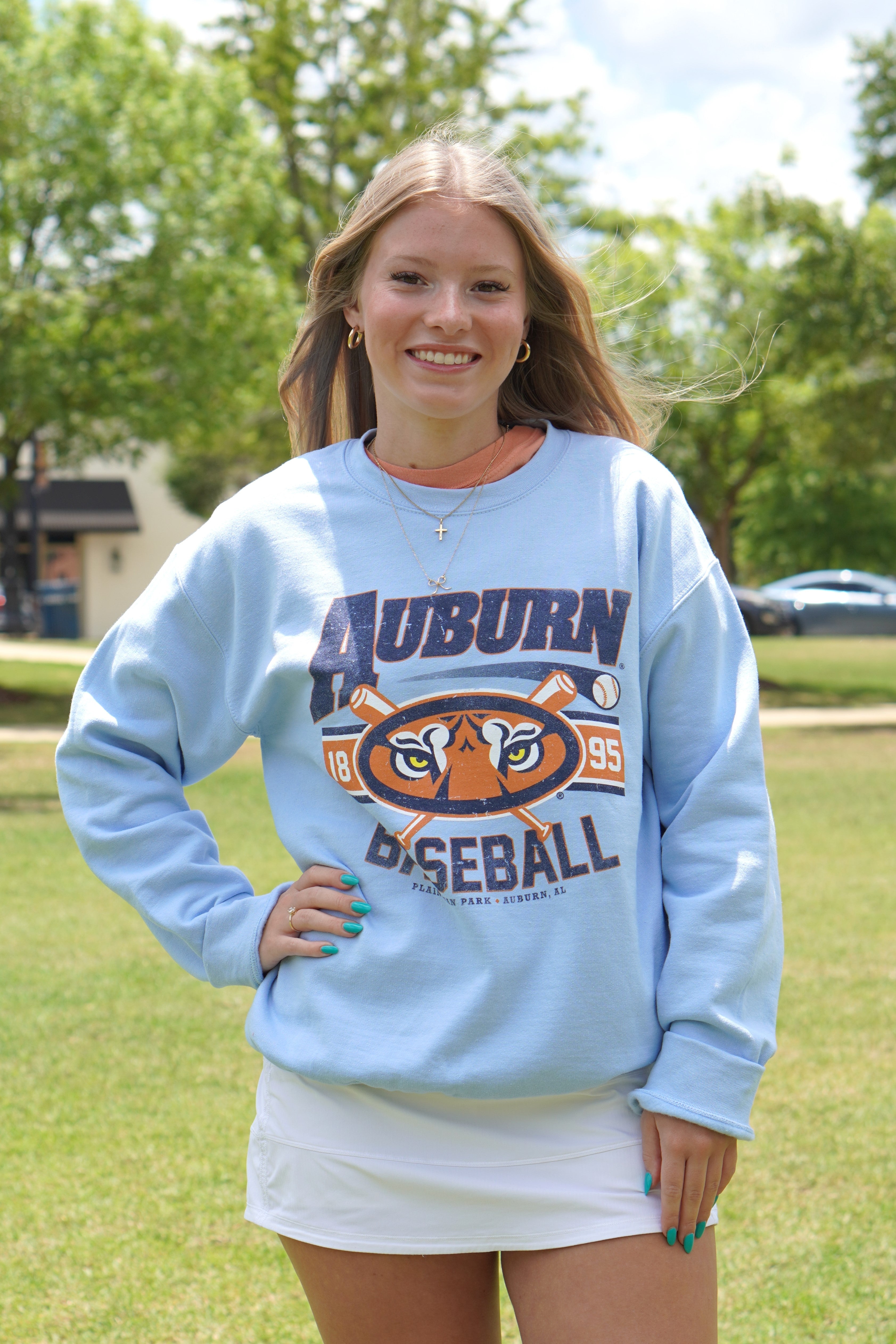 Auburn University Auburn Tiger Eyes Baseball Light Blue Gildan Sweatshirt with text "Auburn" above the Tiger Eyes graphic on top two crossed baseball bats