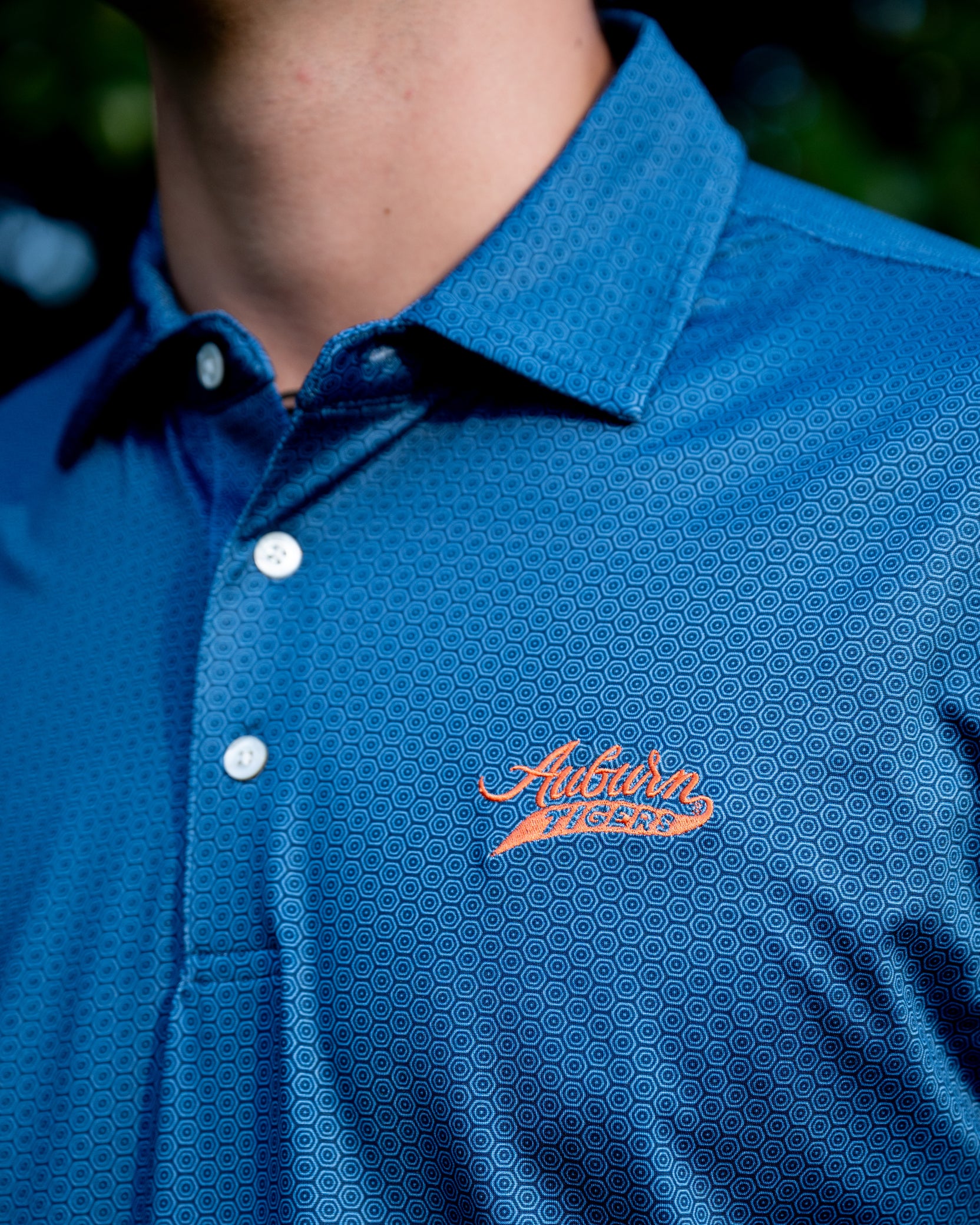 Auburn University Auburn Tigers Navy Hex Polo Men's Navy JNJ Performance polo with a subtle hex pattern and an embroidered Auburn Tigers script logo on the left chest.