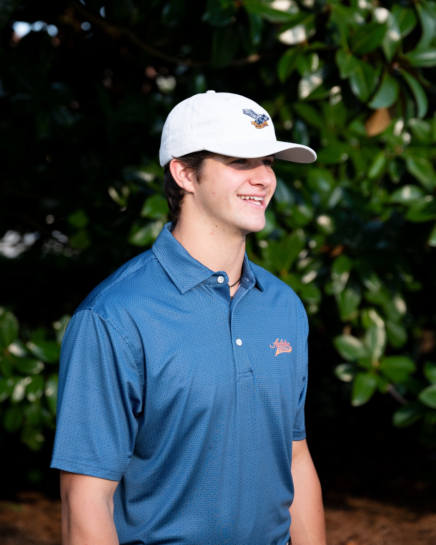 Auburn University Auburn Tigers Navy Hex Polo Men's Navy JNJ Performance polo with a subtle hex pattern and an embroidered Auburn Tigers script logo on the left chest.