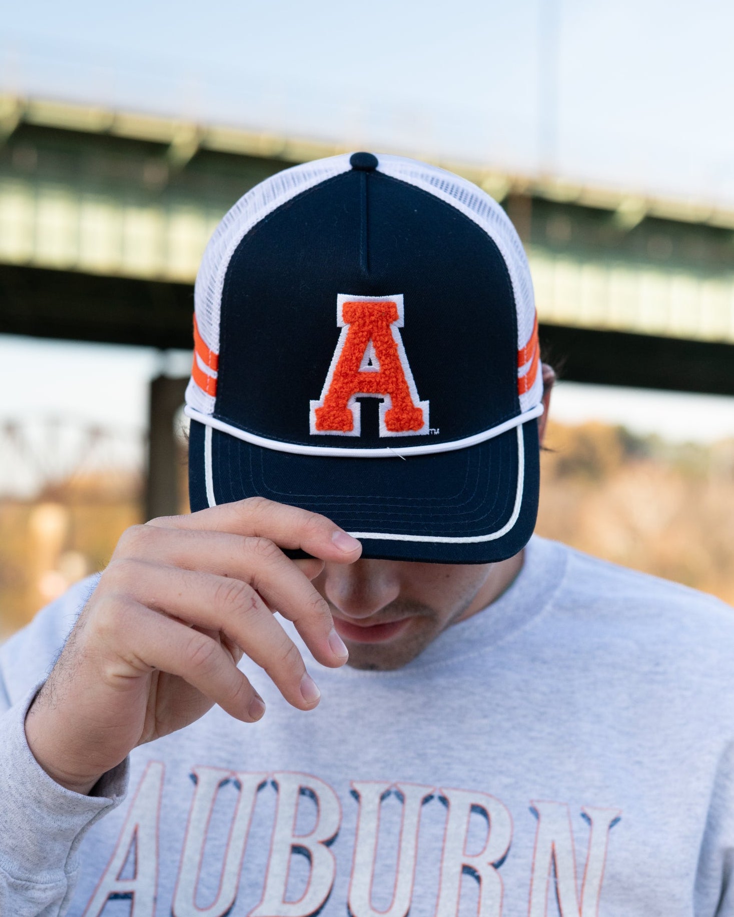Auburn University Navy and White Trucker Hat with White piping and a fuzzy Orange Block A patch