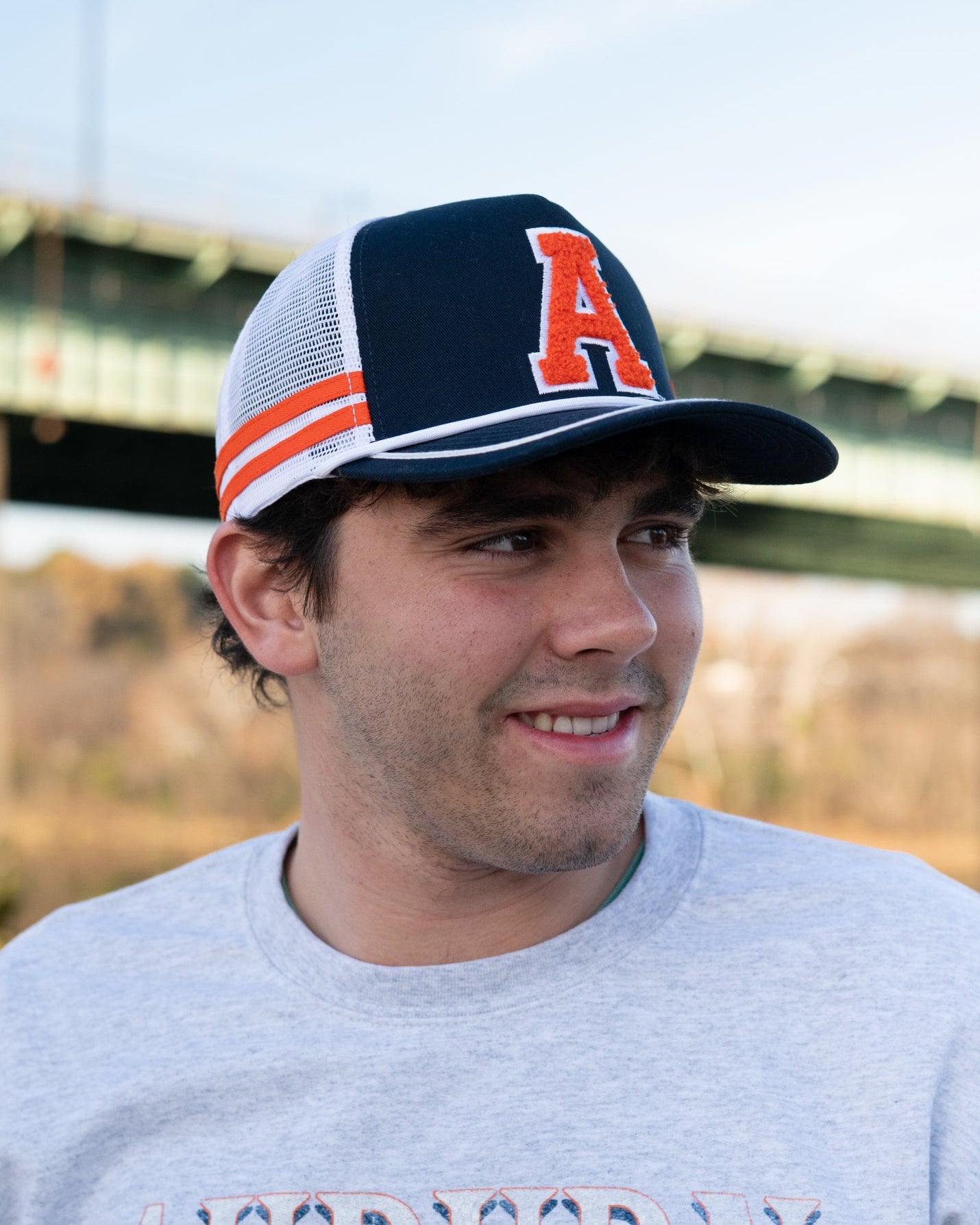 Auburn University Navy and White Trucker Hat with White piping and a fuzzy Orange Block A patch