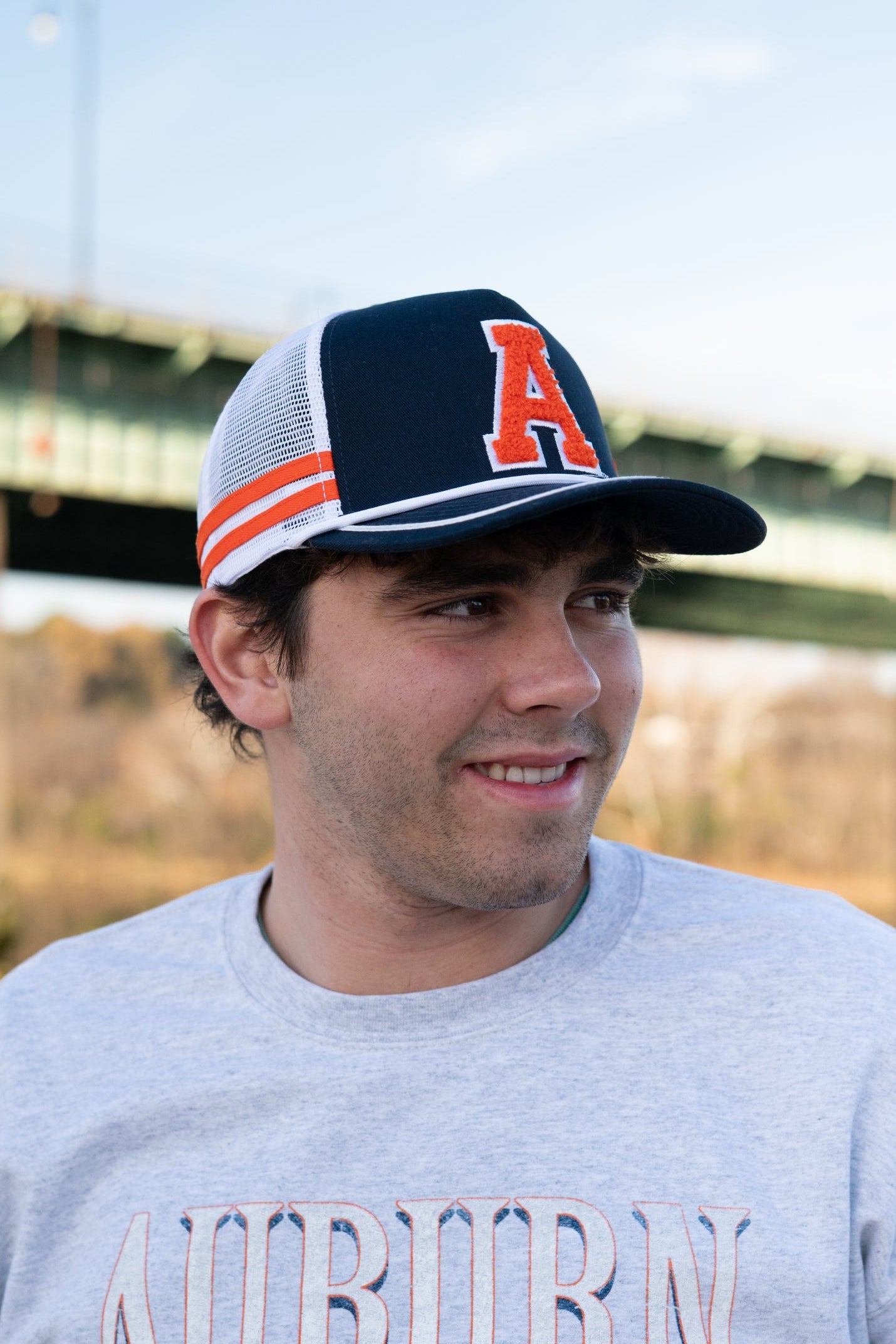 Auburn University Navy and White Trucker Hat with White piping and a fuzzy Orange Block A patch