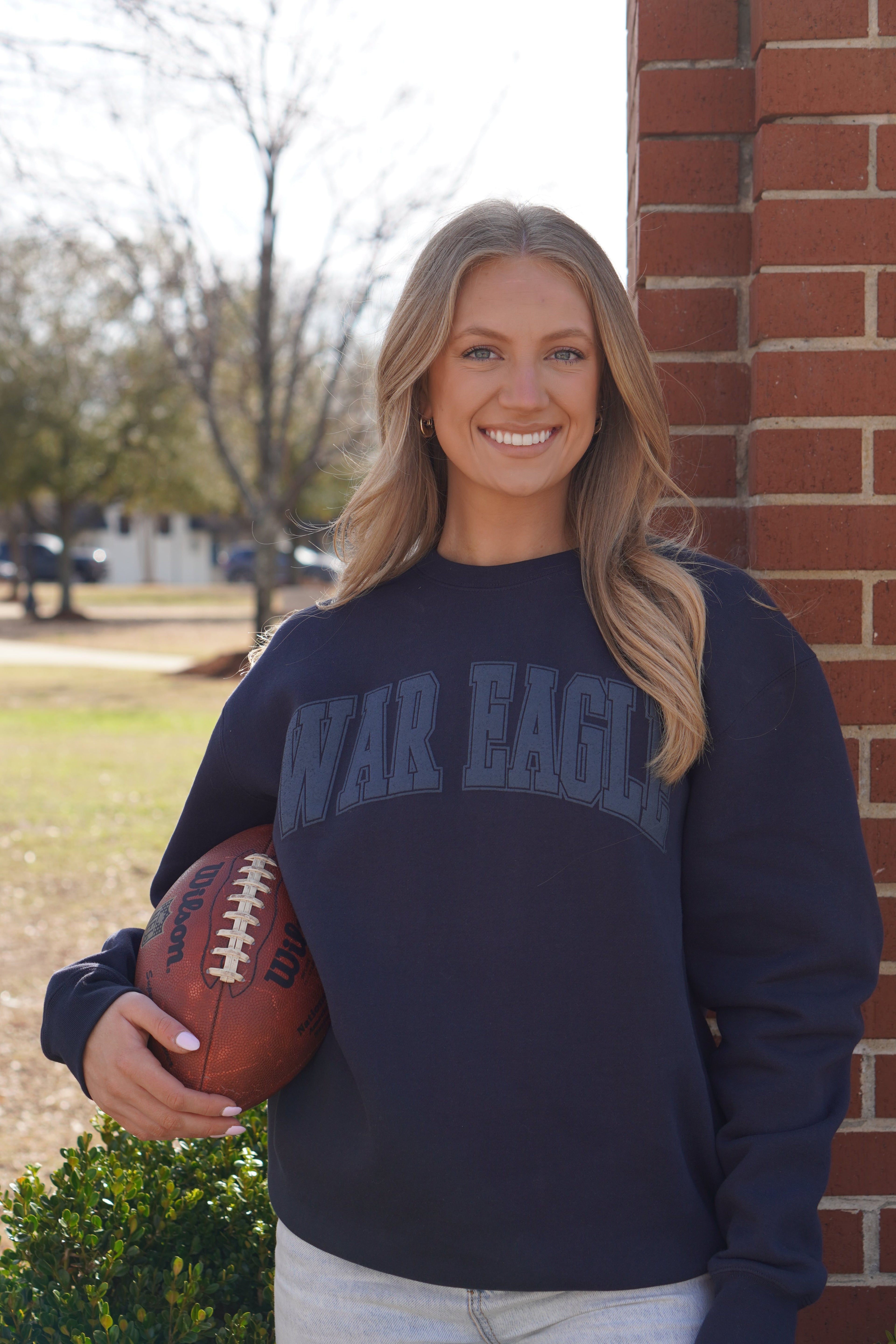 Auburn University Auburn Varsity Ladies Navy Independent Sweatshirt with an oversized War Eagle print. (Front)