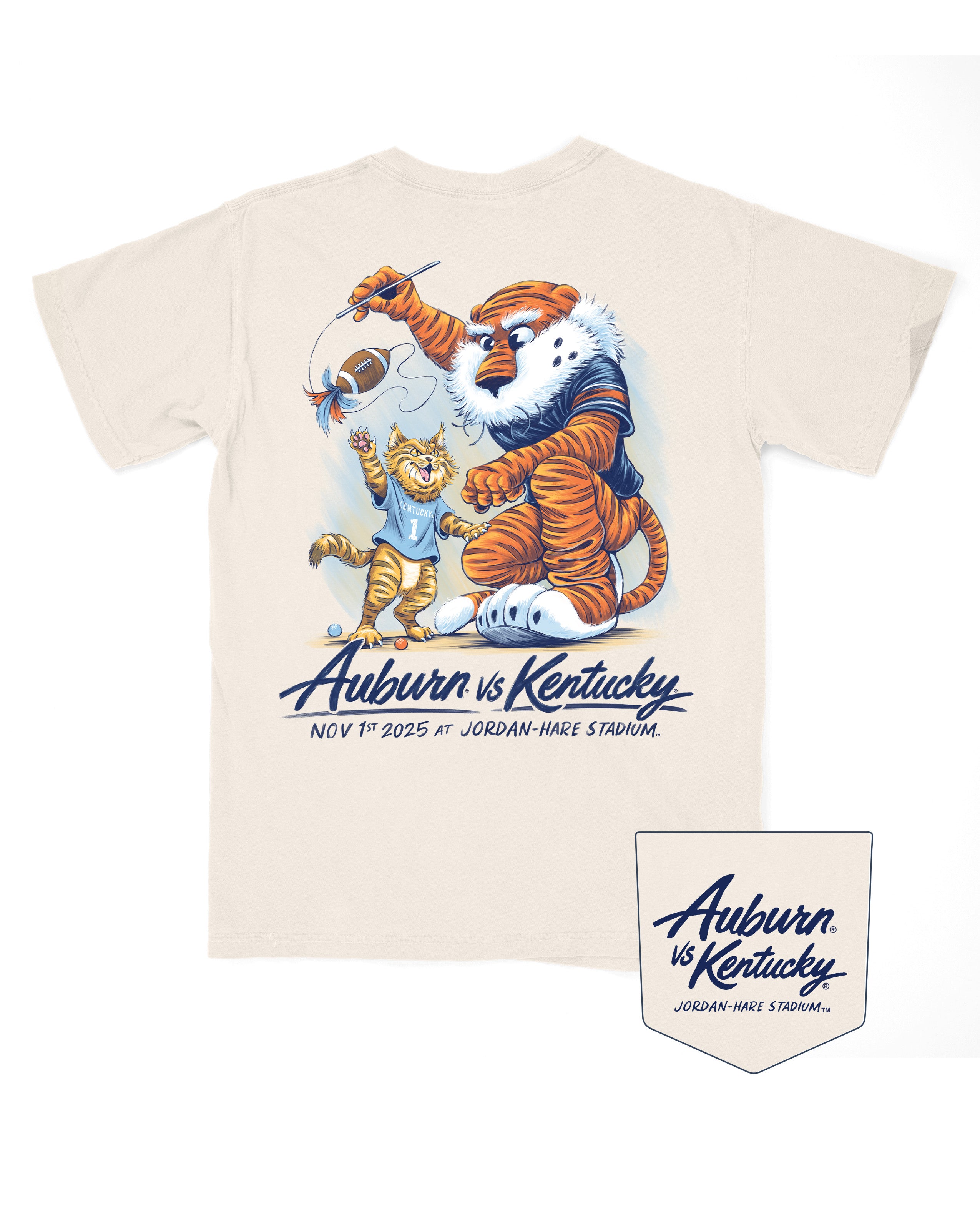 Auburn University Ivory T-Shirt with Aubie dangling a football cat toy in front of The Kentucky Wildcat above text “Auburn vs. Kentucky Nov 1st 2025 at Jordan-Hare Stadium