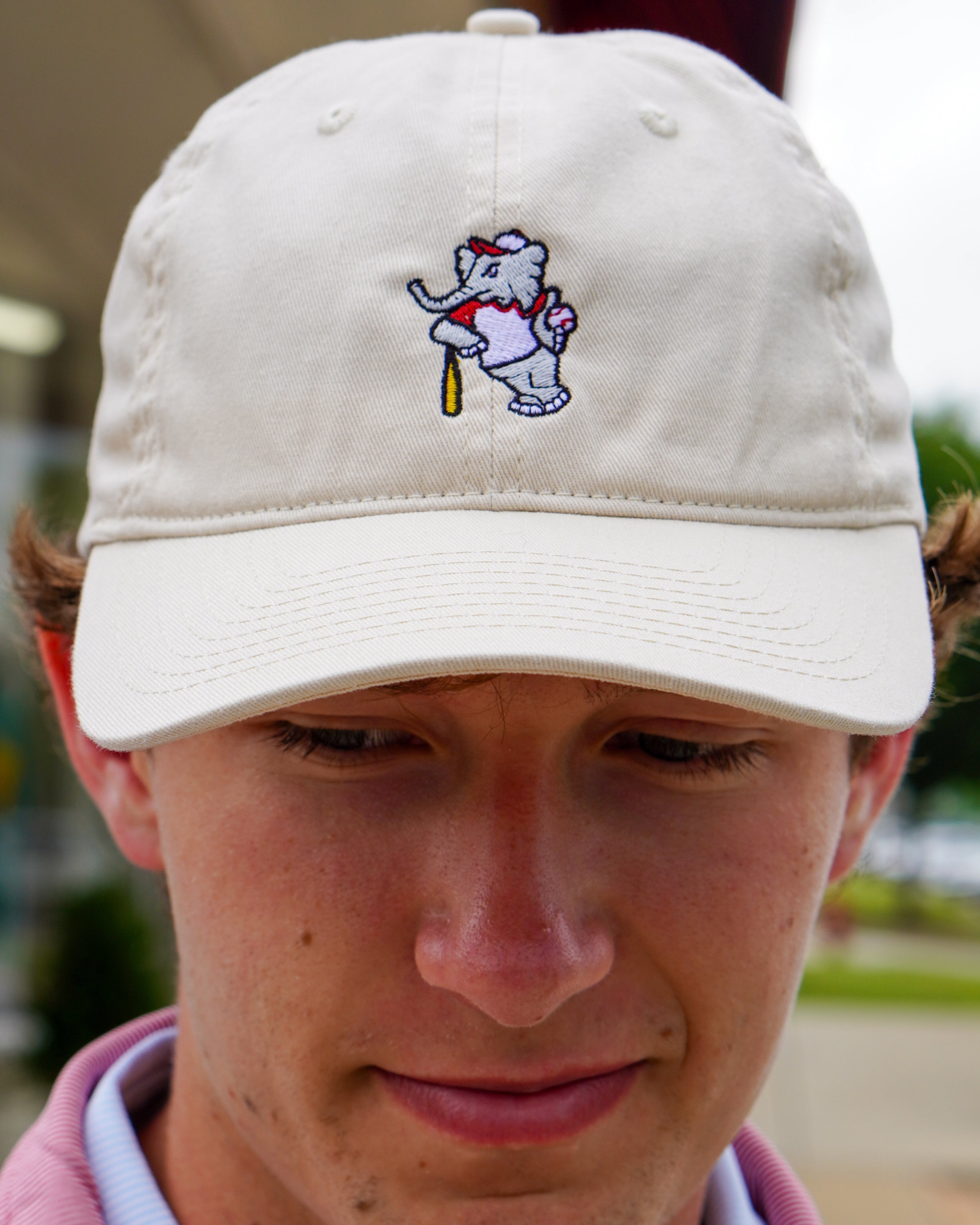 University of Alabama BallPlayer Al Khaki Men's Dad Hat with an embroidered image of Big Al in a baseball uniform leaning on a baseball bat
