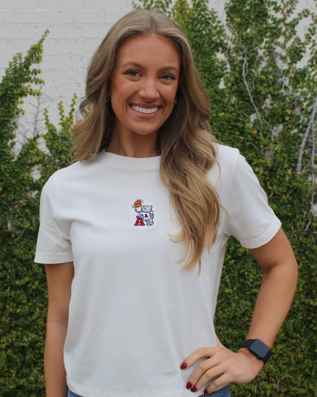 University of Alabama Off-White Ladies Short Sleeve T-Shirt with the Basketball Al Logo embroidered on the middle of the chest