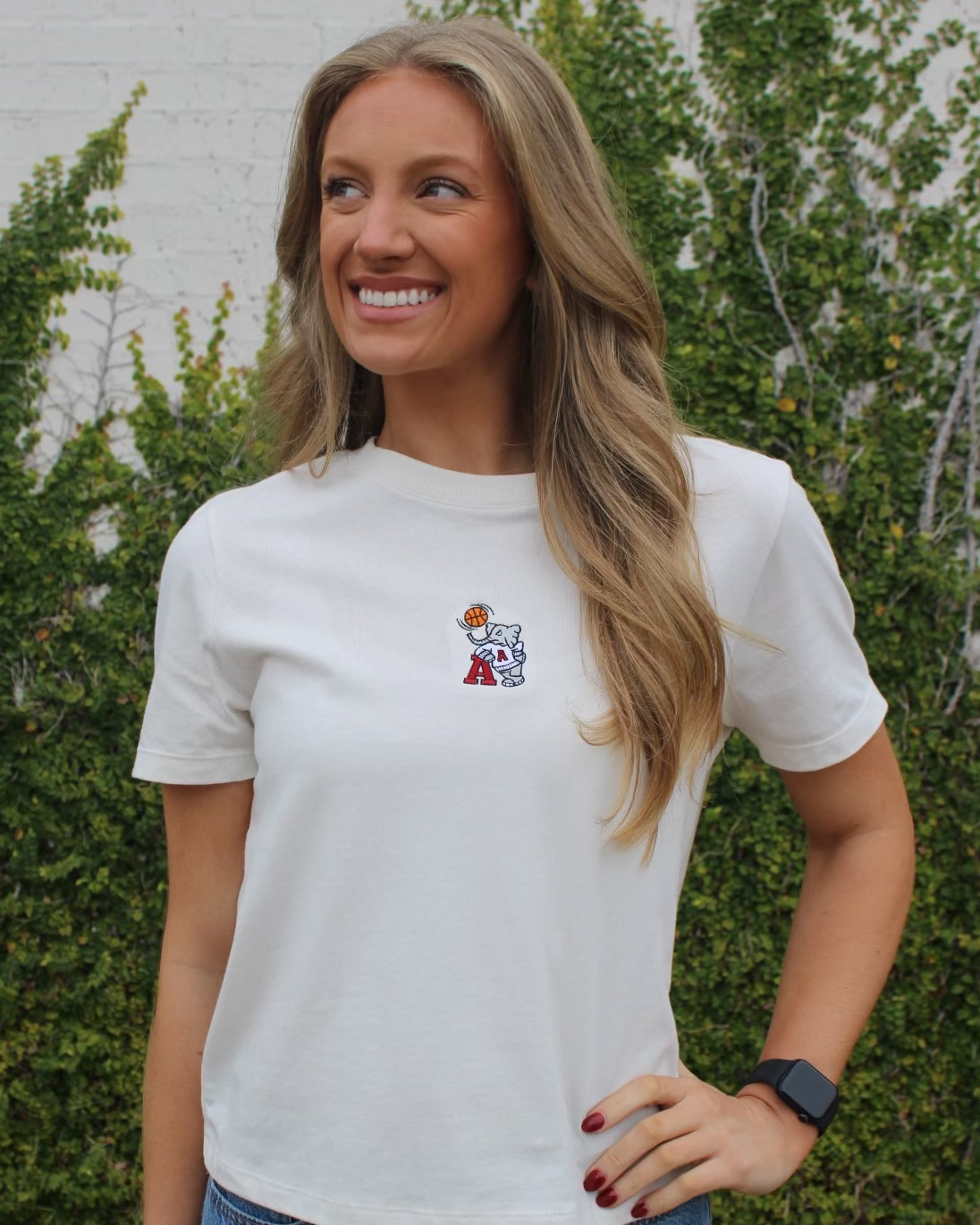 University of Alabama Off-White Ladies Short Sleeve T-Shirt with the Basketball Al Logo embroidered on the middle of the chest