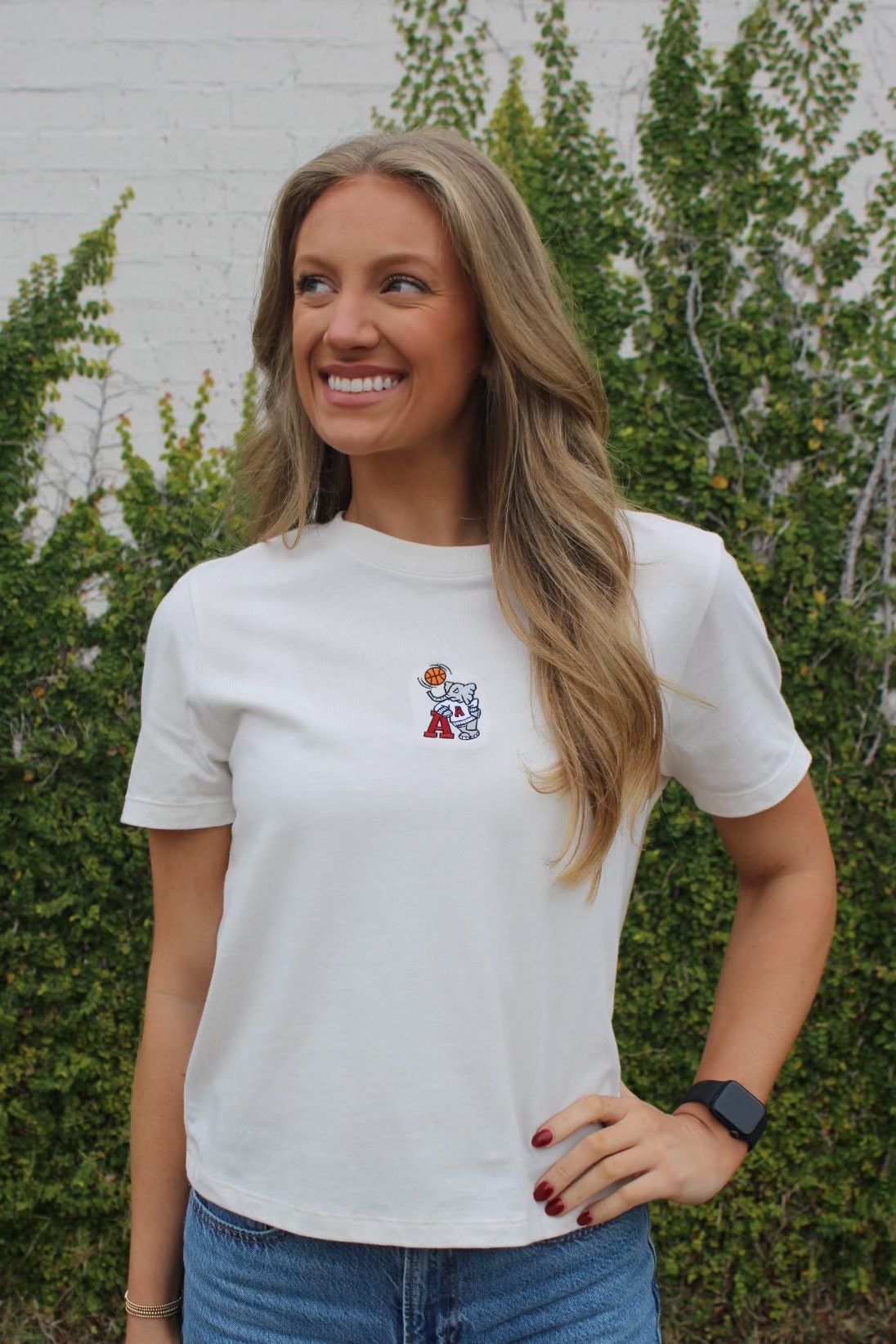 University of Alabama Off-White Ladies Short Sleeve T-Shirt with the Basketball Al Logo embroidered on the middle of the chest