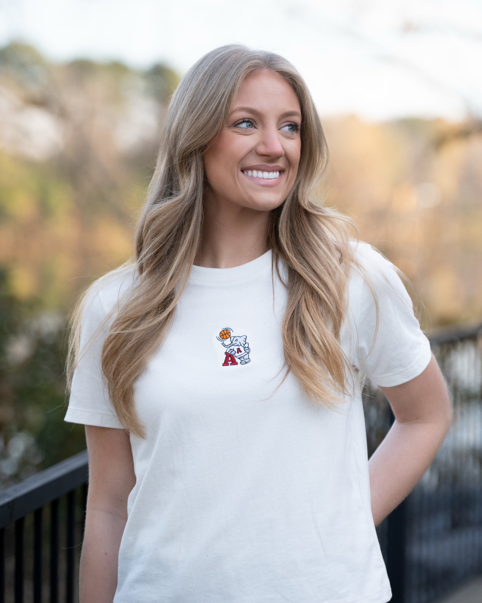 University of Alabama Off-White Ladies Short Sleeve T-Shirt with the Basketball Al Logo embroidered on the middle of the chest