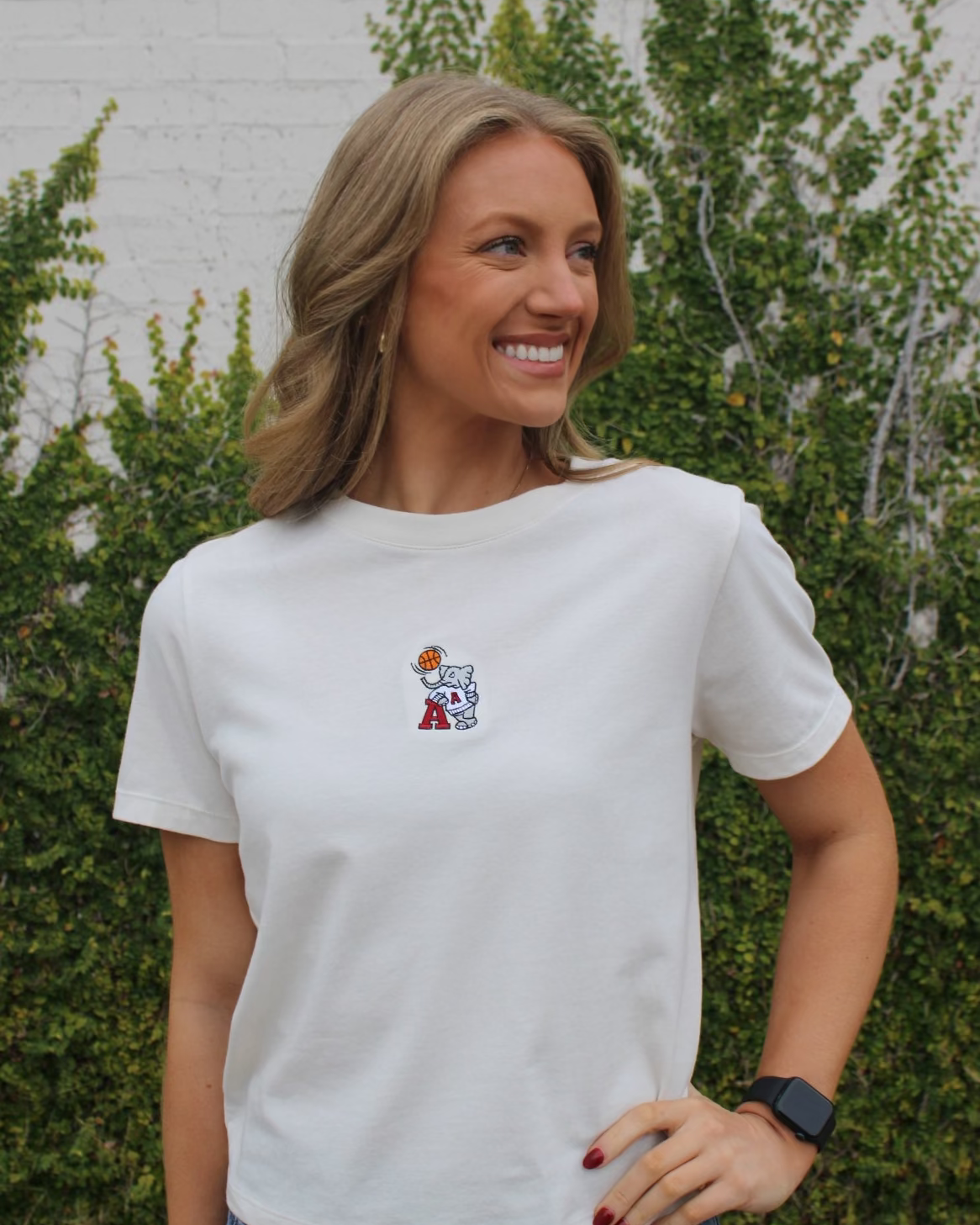 University of Alabama Off-White Ladies Short Sleeve T-Shirt with the Basketball Al Logo embroidered on the middle of the chest