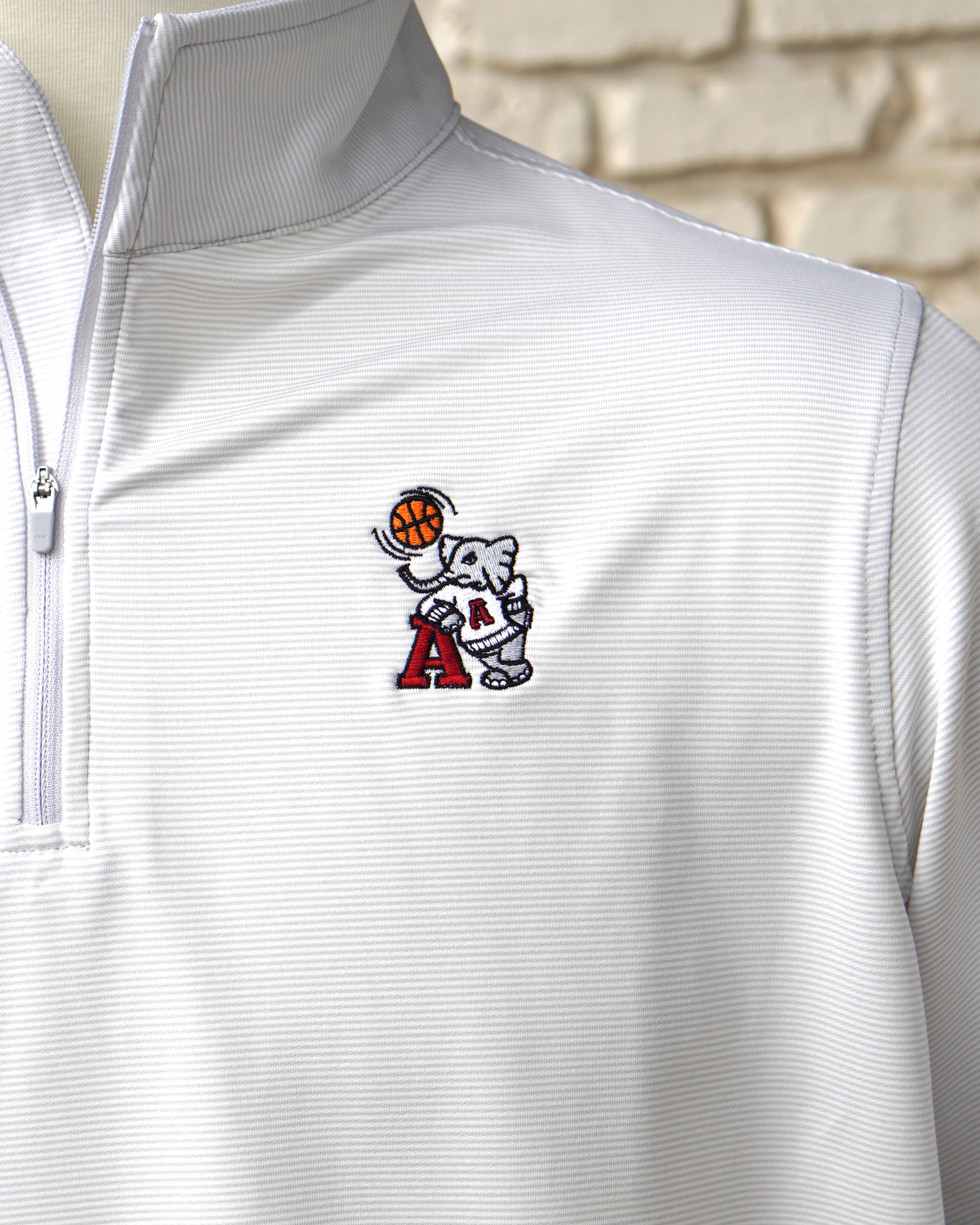 University of Alabama Basketball Al Men's Light Grey 1/4 Zip with an embroidered Big Al in a sweater holding a basketball and leaning against an "A"