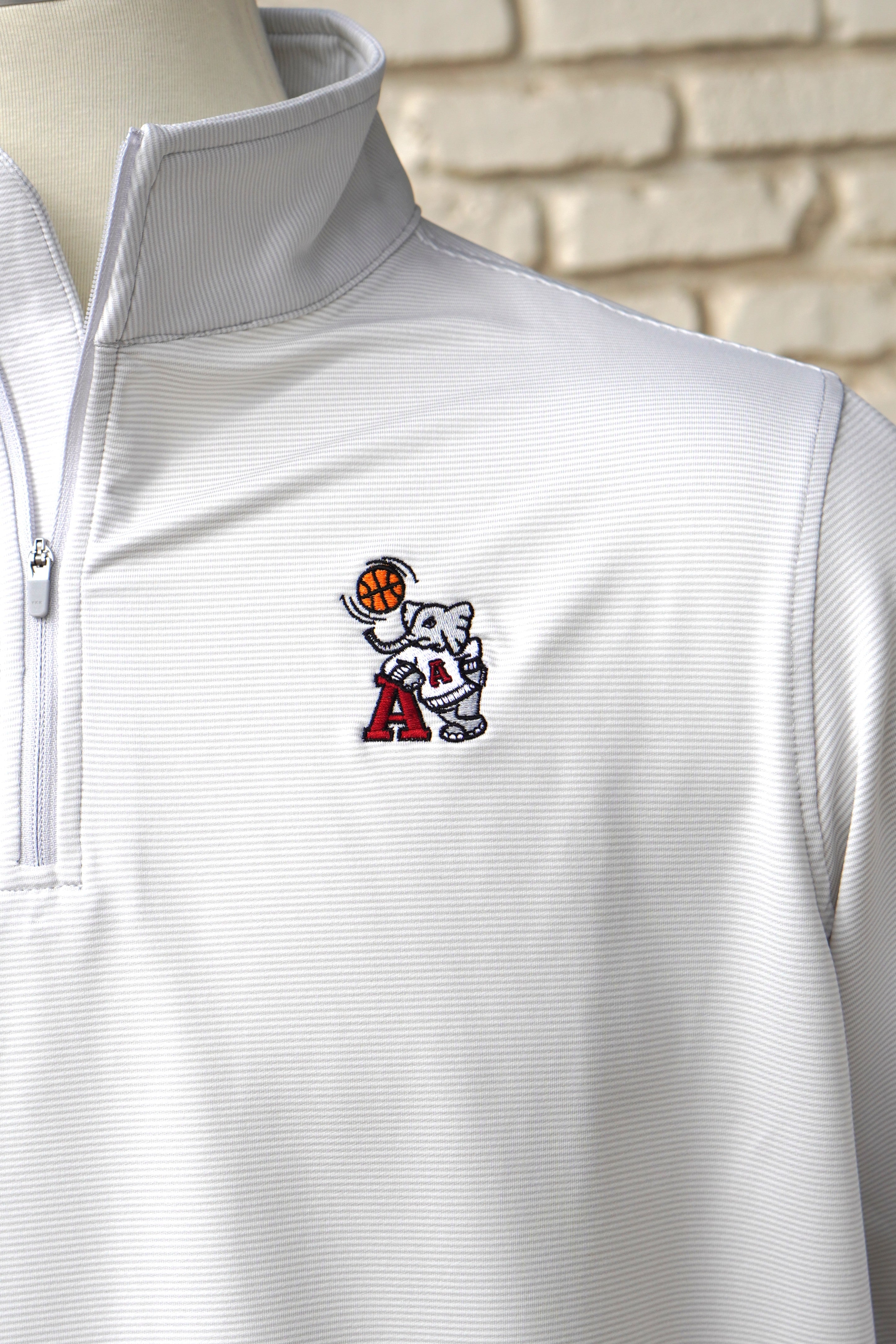 University of Alabama Basketball Al Men's Light Grey 1/4 Zip with an embroidered Big Al in a sweater holding a basketball and leaning against an "A"