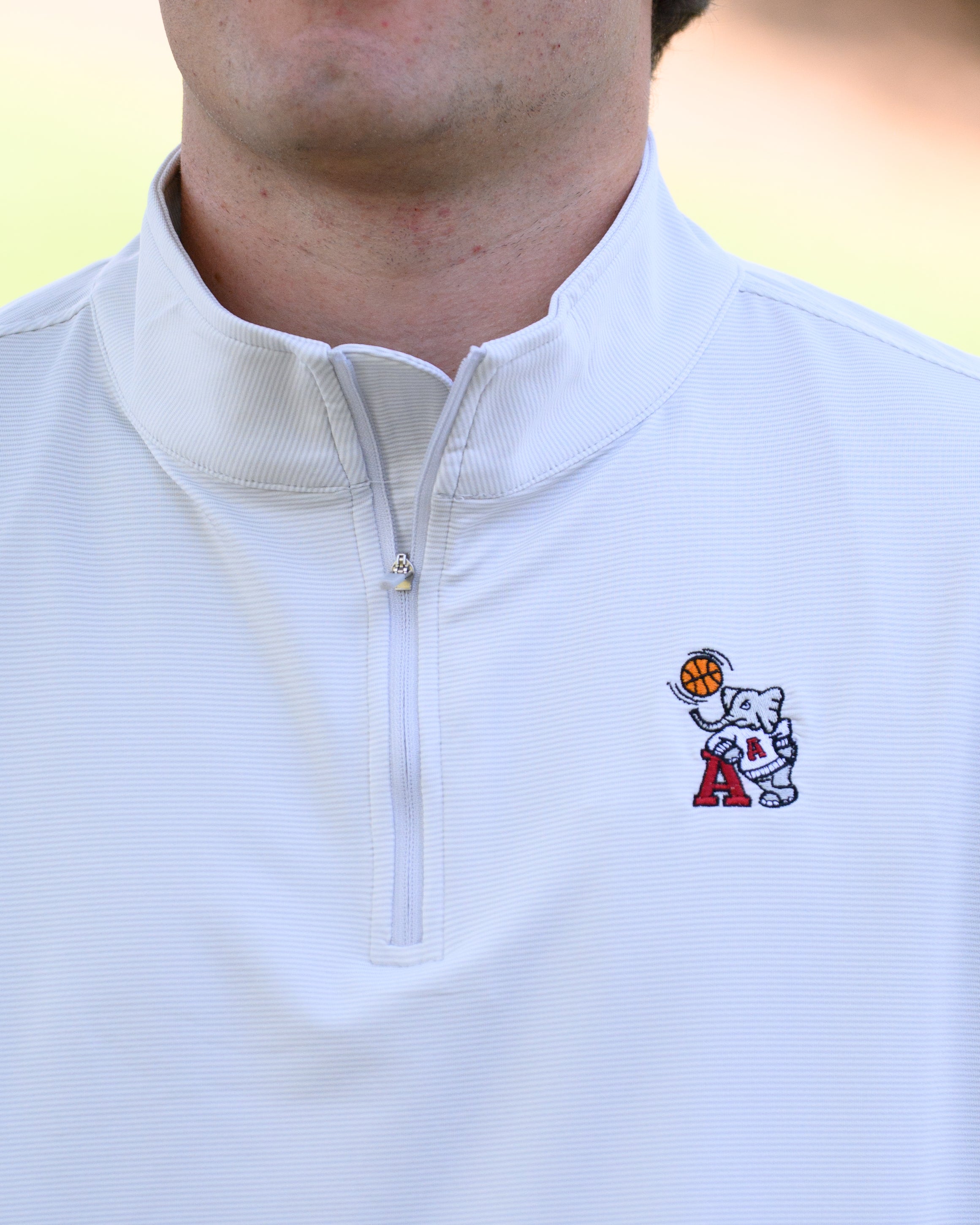 University of Alabama Basketball Al Men's Light Grey 1/4 Zip with an embroidered Big Al in a sweater holding a basketball and leaning against an "A"