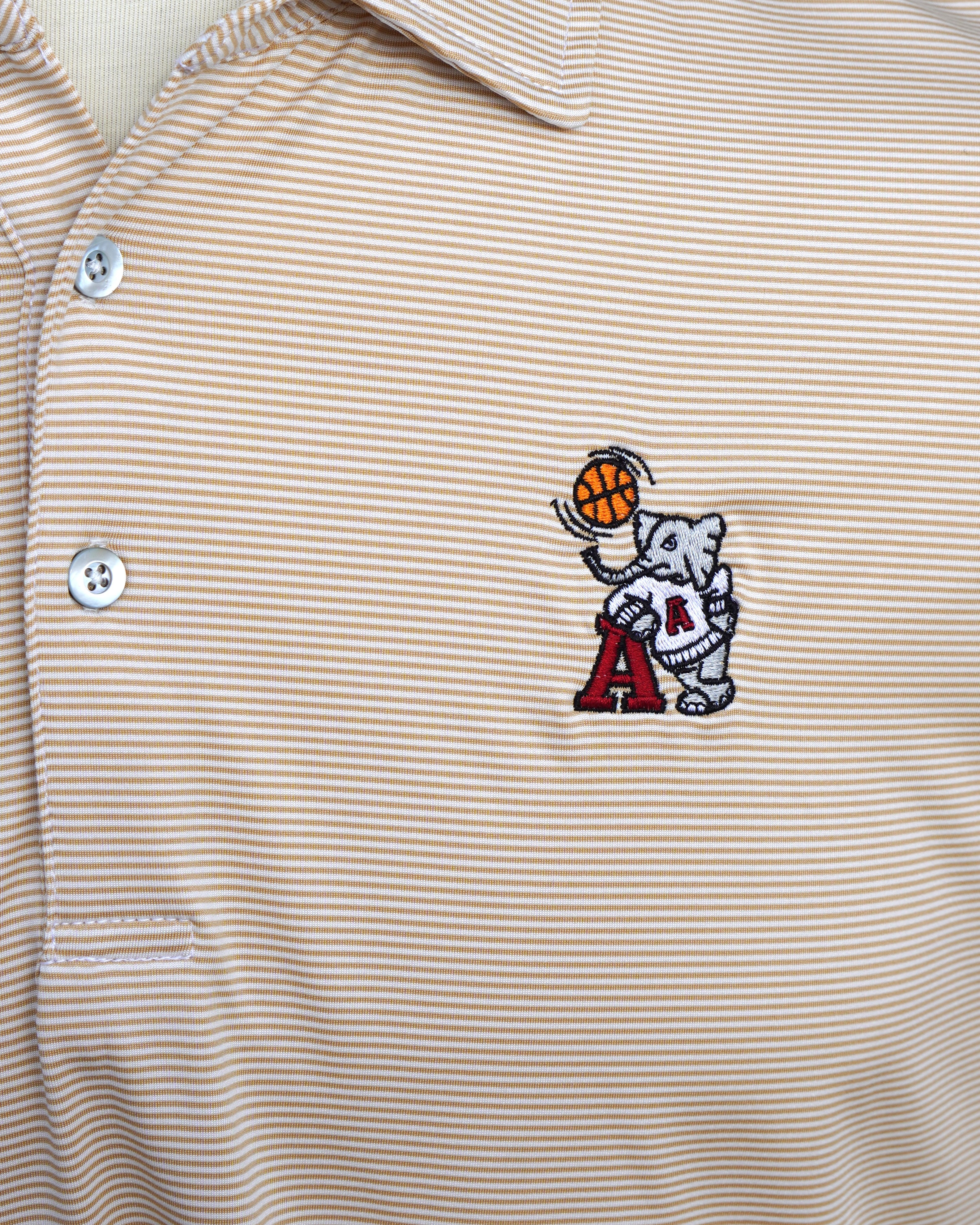 University of Alabama Basketball Al Tan Men’s Polo with an embroidered Big Al in a sweater holding a basketball and leaning against an "A"
