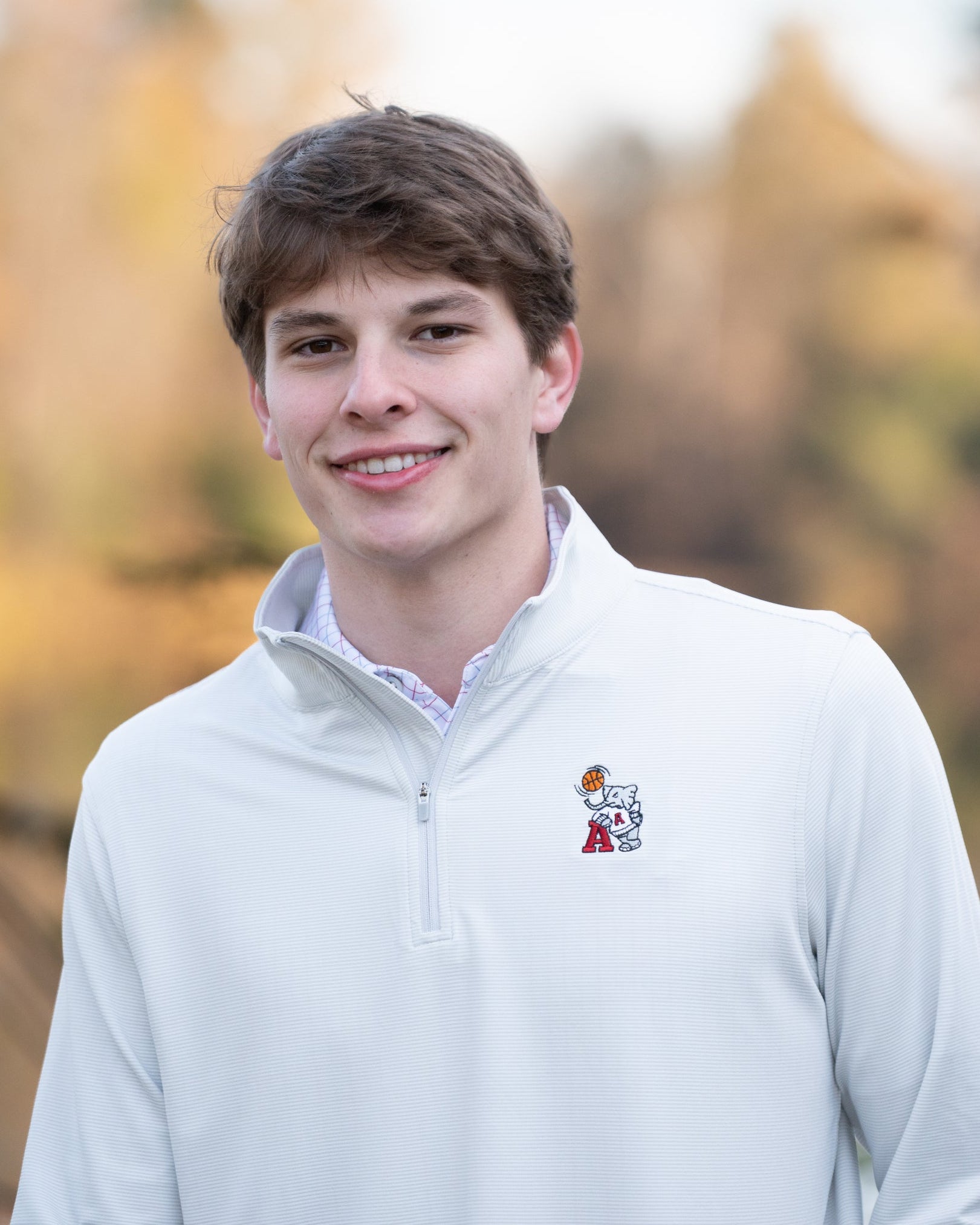 University of Alabama Basketball Al Men's Light Grey 1/4 Zip with an embroidered Big Al in a sweater holding a basketball and leaning against an "A"