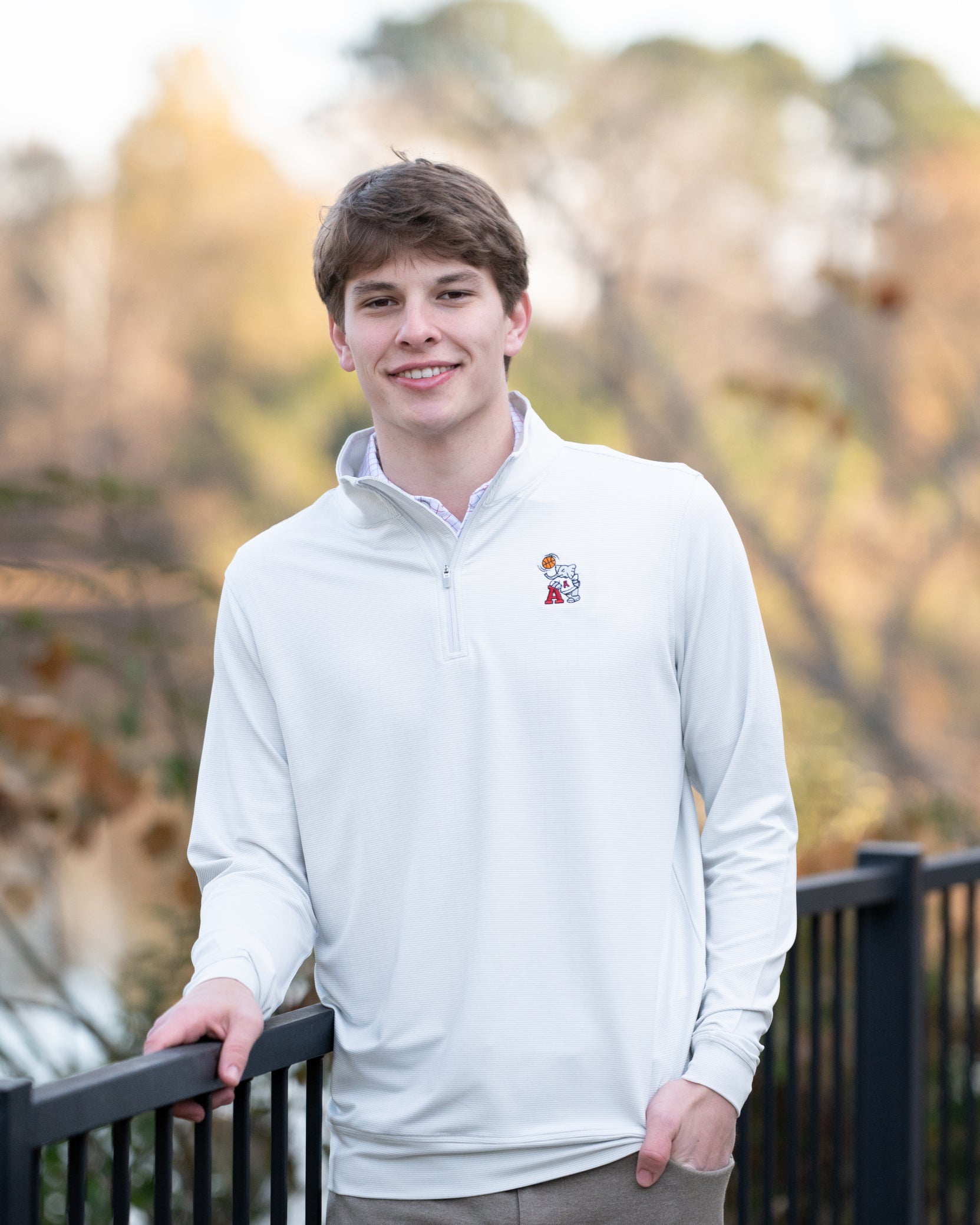 University of Alabama Basketball Al Men's Light Grey 1/4 Zip with an embroidered Big Al in a sweater holding a basketball and leaning against an "A"