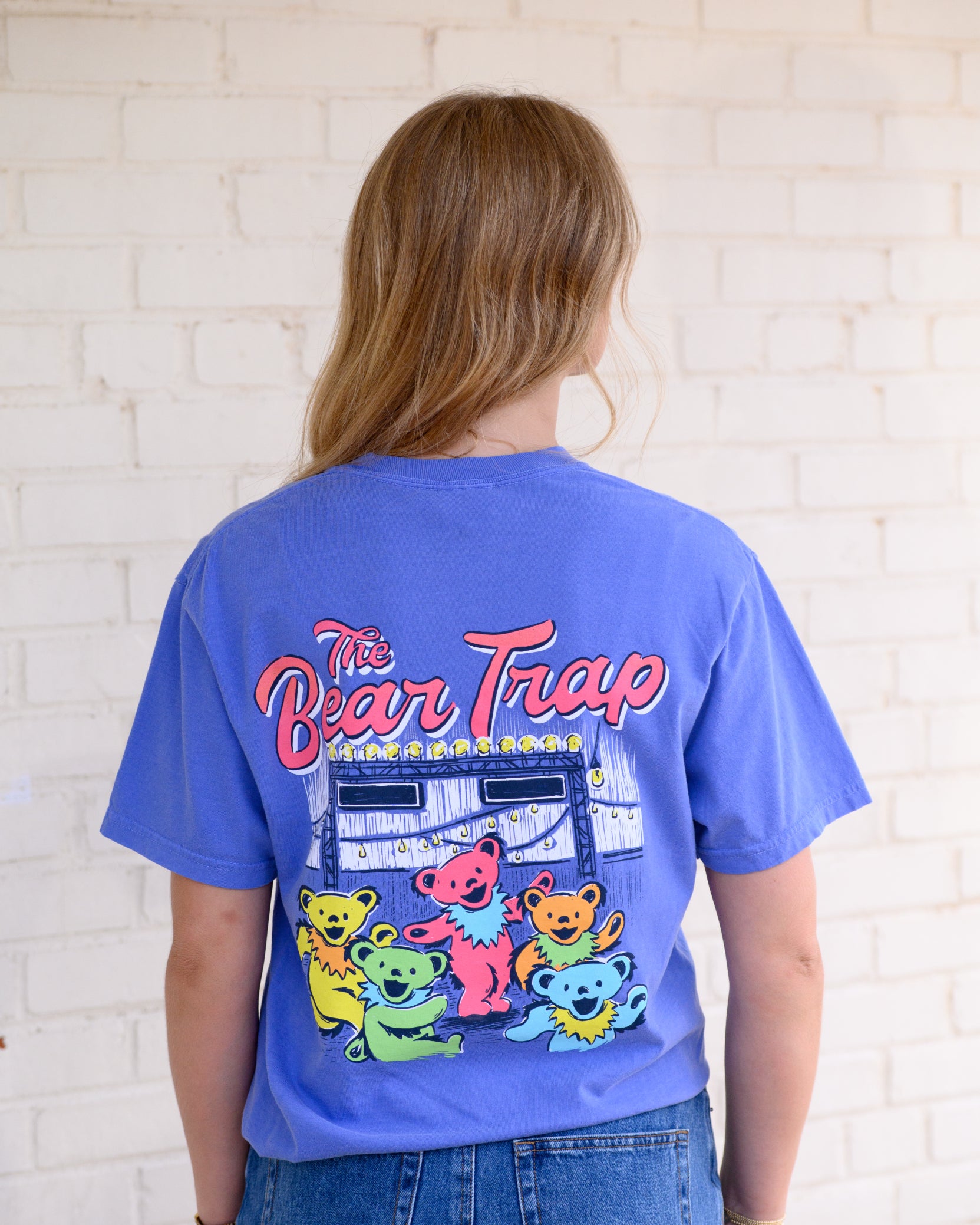 Bear Trap Blue T-Shirt with Dancing Bears under fairy lights and text “The Bear Trap”