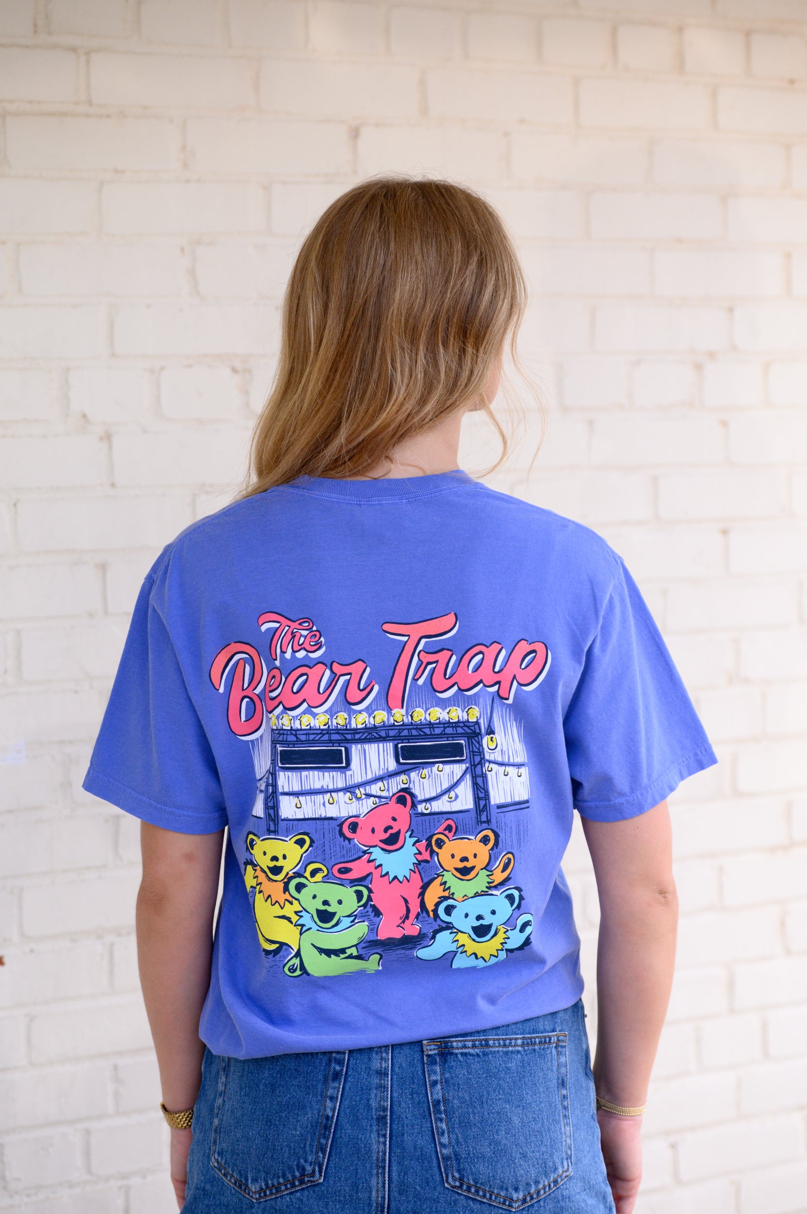 Bear Trap Blue T-Shirt with Dancing Bears under fairy lights and text “The Bear Trap”