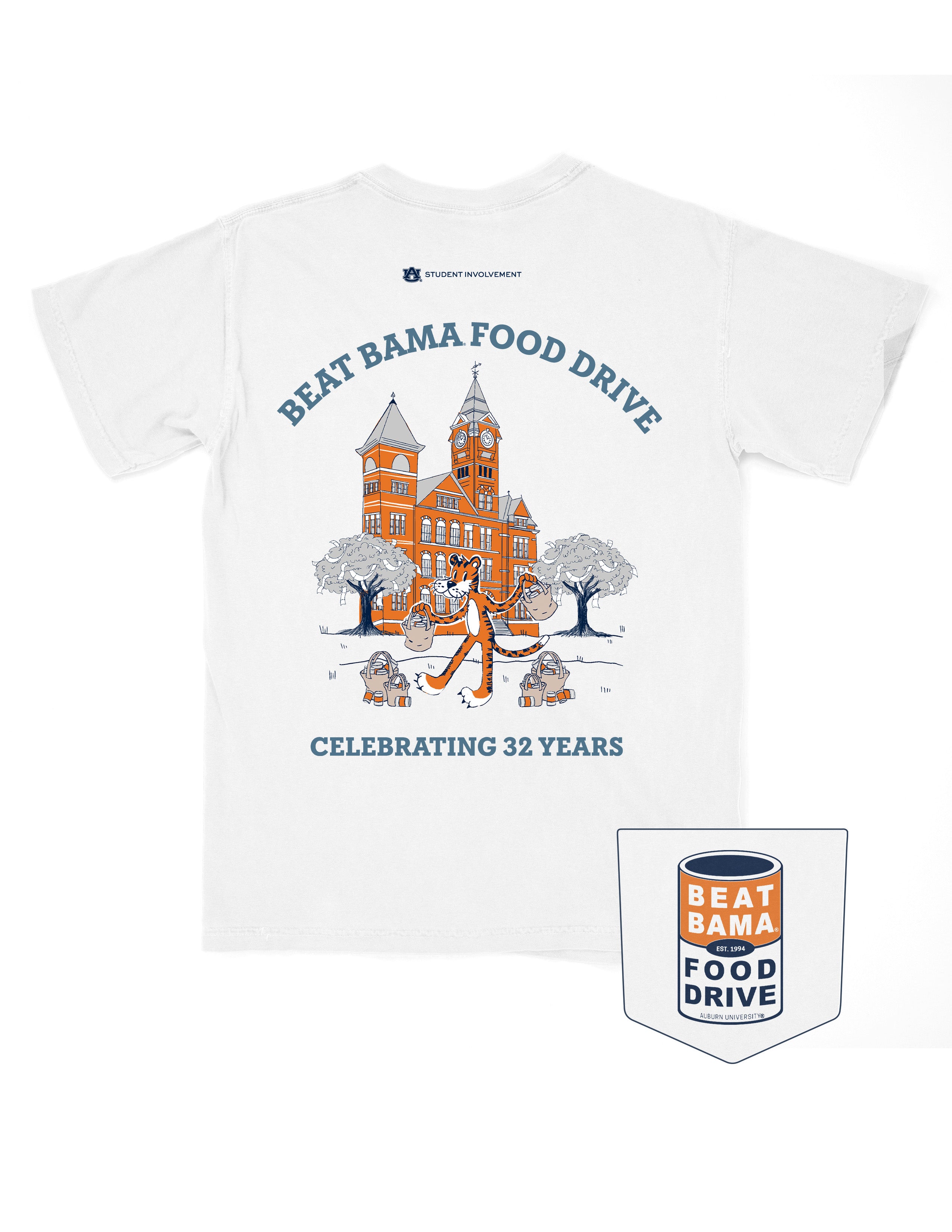 Auburn University White T-Shirt with Aubie collecting cans around Stamford Hall with Blue Text “Beat Bama Food Drive Celebrating 32 Years”