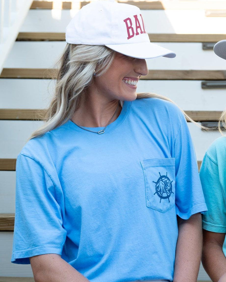 University of Alabama Blue Shirt with a front pocket featuring a ship’s wheel behind a Sailor Big Al design