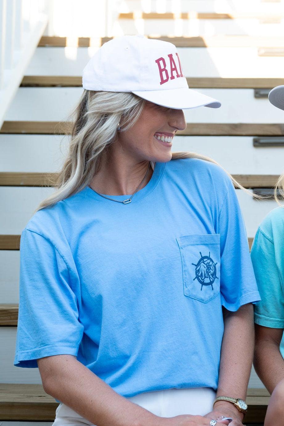 University of Alabama Blue Shirt with a front pocket featuring a ship’s wheel behind a Sailor Big Al design