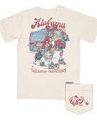 University of Alabama Cream Big Al Tailgate Comfort Colors T-Shirt with an image of Big Al in Gameday Gear with a cooler and a grill above text "Tailgatin' Traditions"