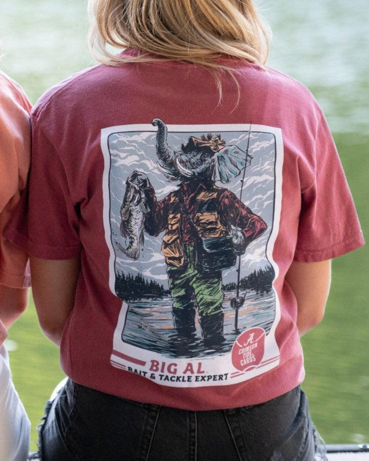 University of Alabama Big Al Fishing Comfort Colors Red T-Shirt with image of Big Al standing in the water holding a fishing pole