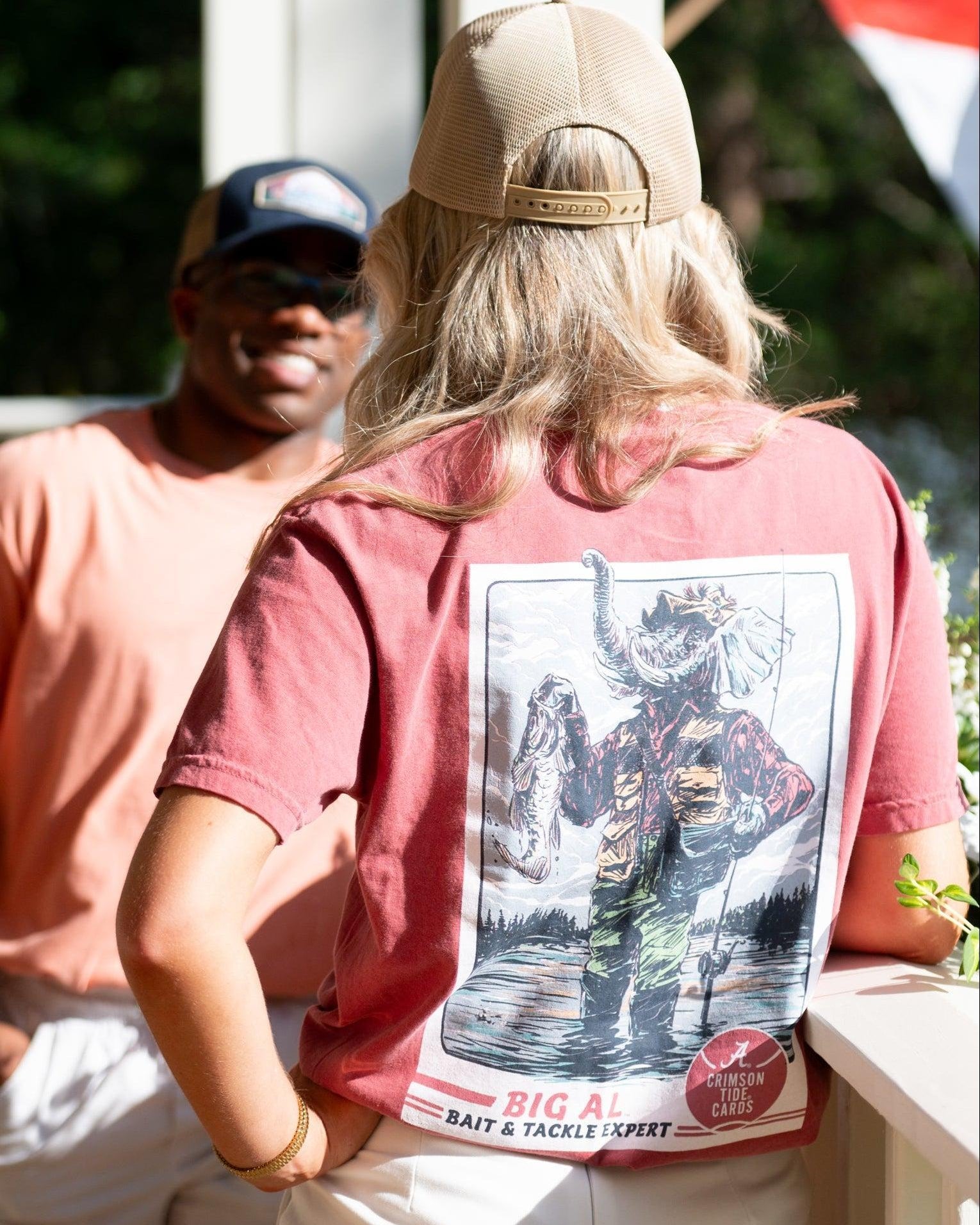 University of Alabama Big Al Fishing Comfort Colors Grey T-Shirt with image of Big Al standing in the water holding a fishing pole