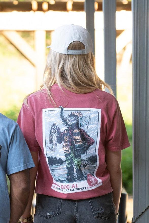 University of Alabama Big Al Fishing Comfort Colors Grey T-Shirt with image of Big Al standing in the water holding a fishing pole