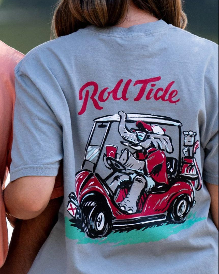 University of Alabama Big Al Golf Cart Grey Comfort Colors -Shirt with the text "Roll Tide" above an image of Big Al wearing sunglasses and driving a golf cart