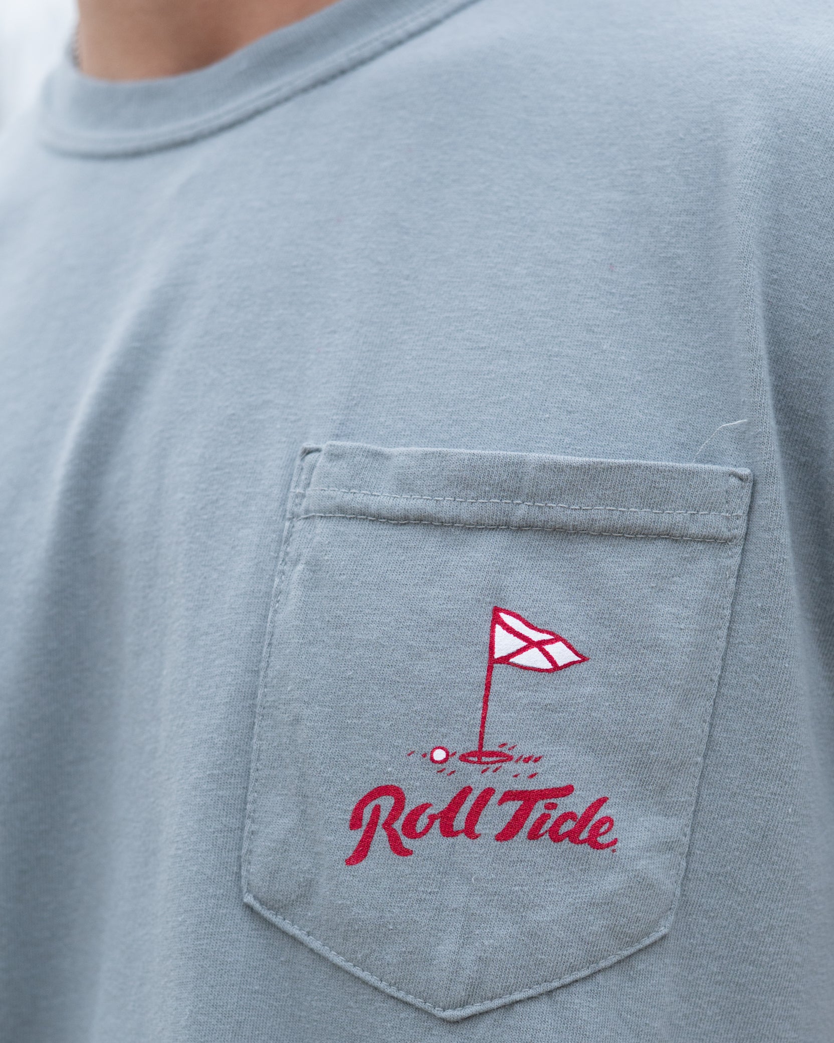 University of Alabama Grey Shirt with a Golf Flag over “Roll Tide” Script on the Front Pocket
