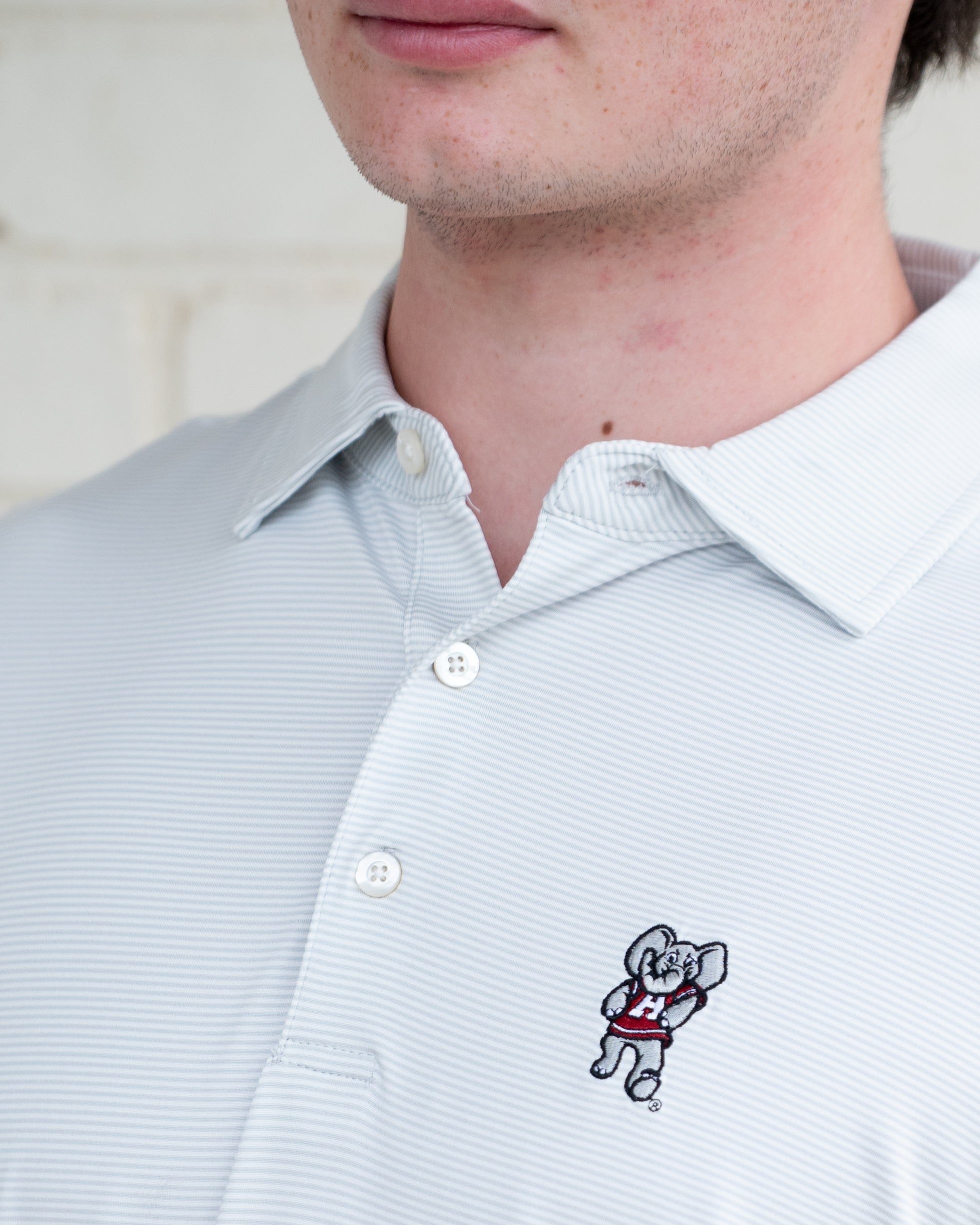 University of Alabama Light Grey Men’s Stripe Polo with the Big Al Logo embroidery