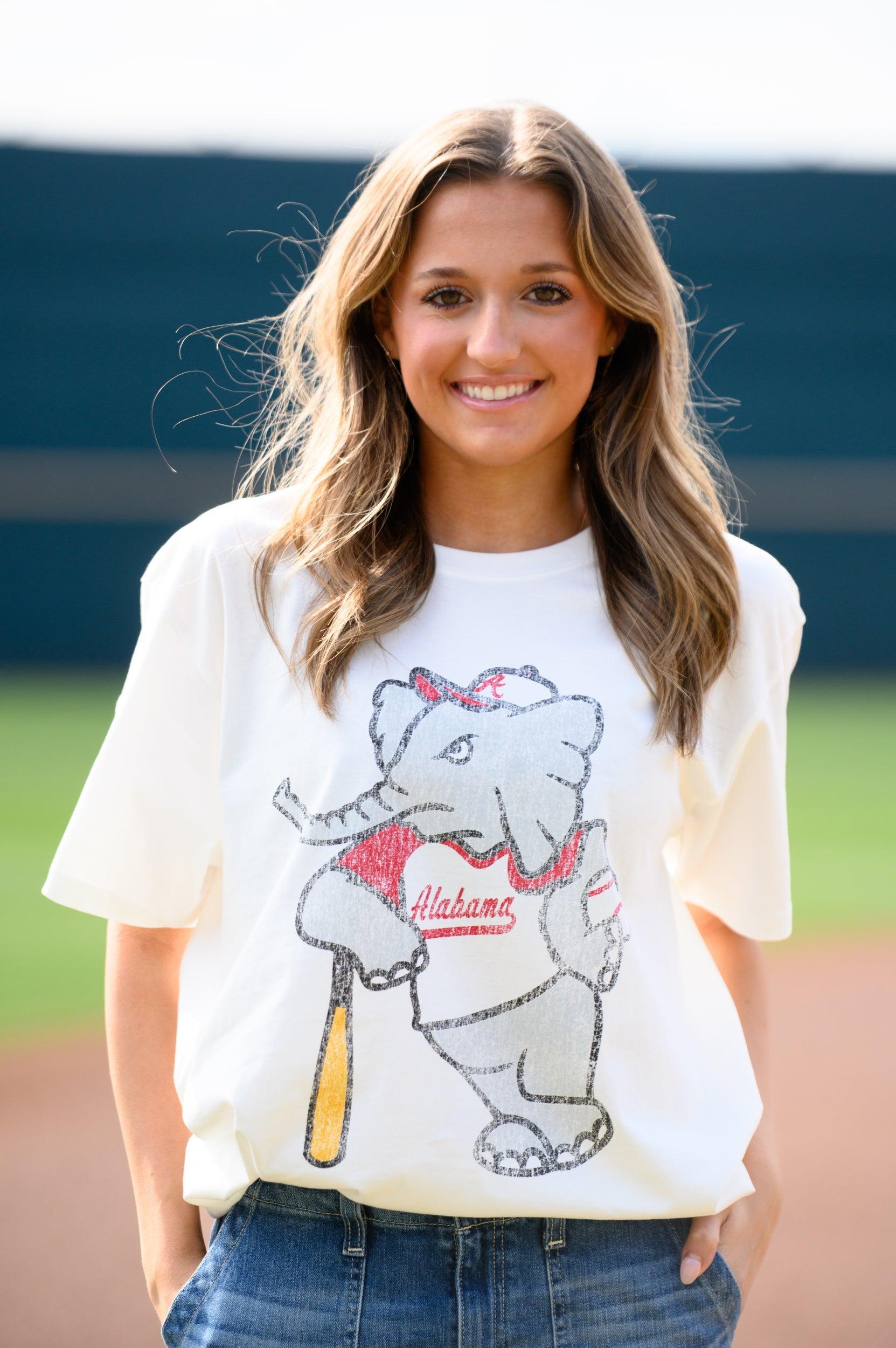 University of Alabama Big Al Vintage Baseball Ivory SoftShirts T-Shirt with an image of a vintage Big Al in a baseball uniform leaning against a baseball bat
