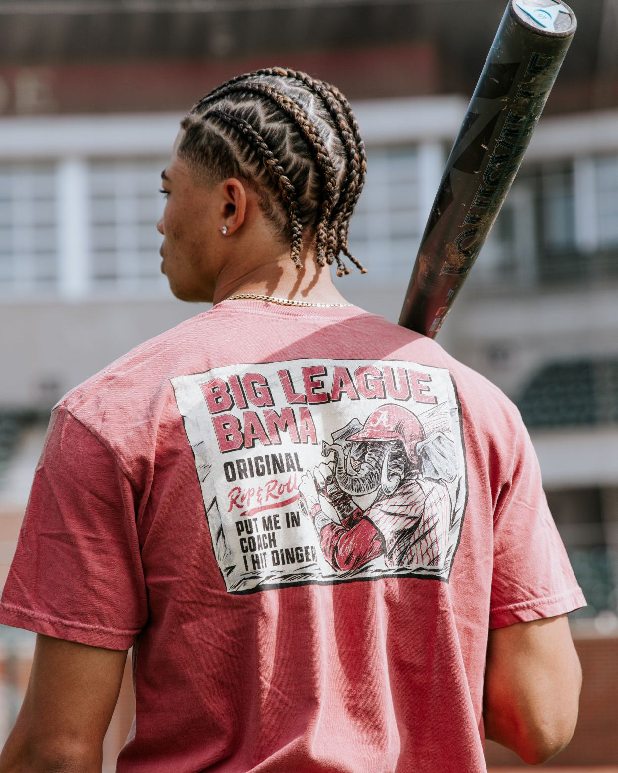 University of Alabama Red Comfort Colors T-Shirt with an image of Big Al in baseball gear swinging a bat below text "Big League Bama"