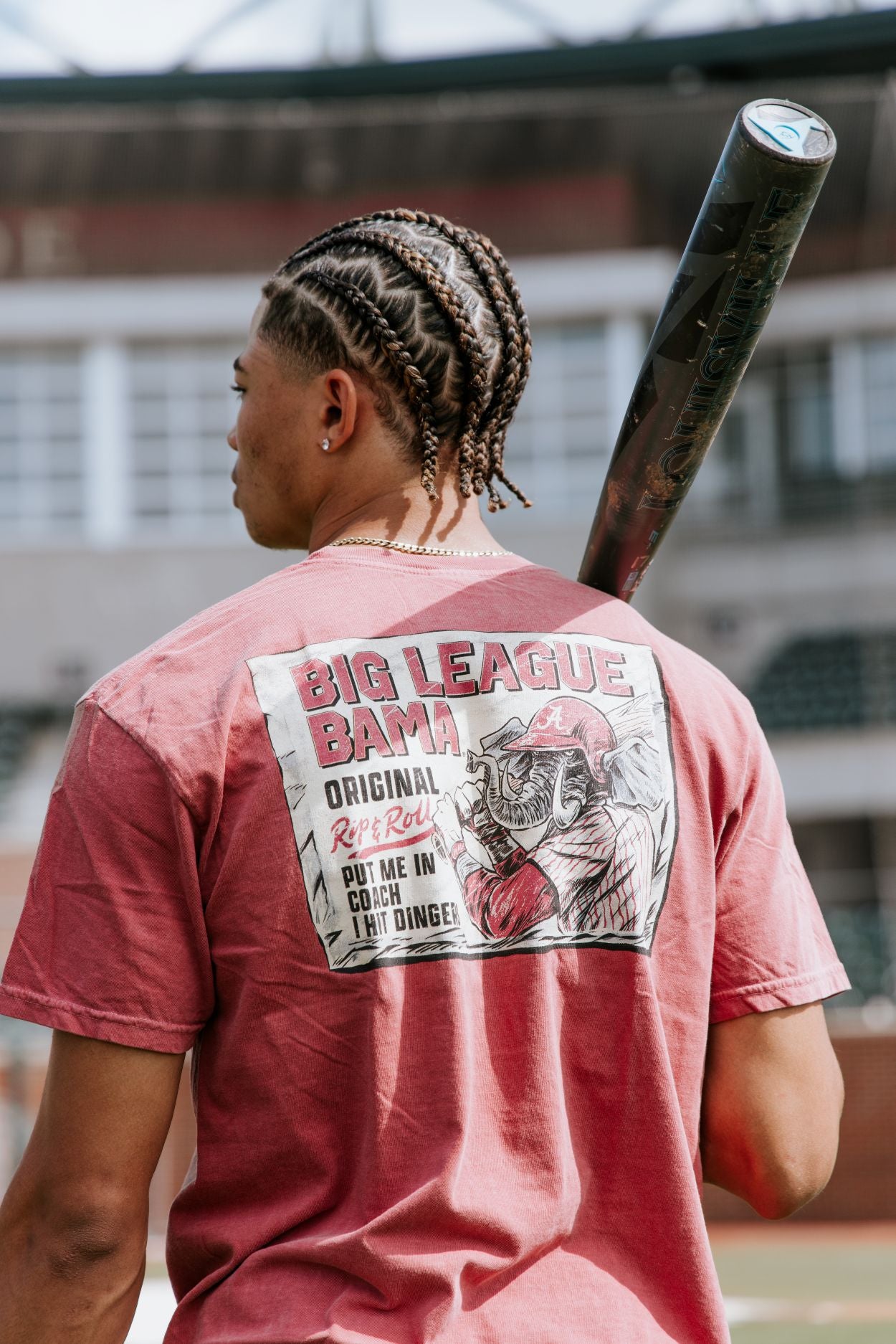 University of Alabama Red Comfort Colors T-Shirt with an image of Big Al in baseball gear swinging a bat below text "Big League Bama"