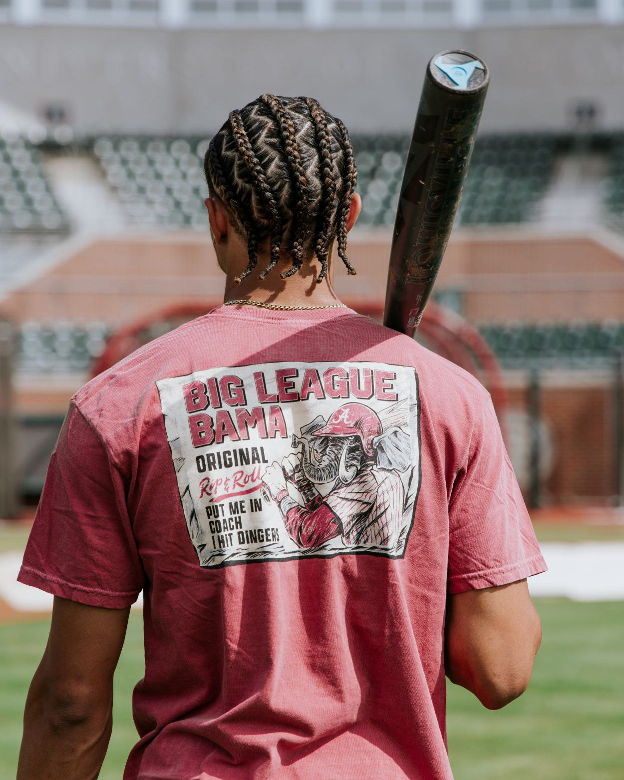 University of Alabama Red Comfort Colors T-Shirt with an image of Big Al in baseball gear swinging a bat below text "Big League Bama"