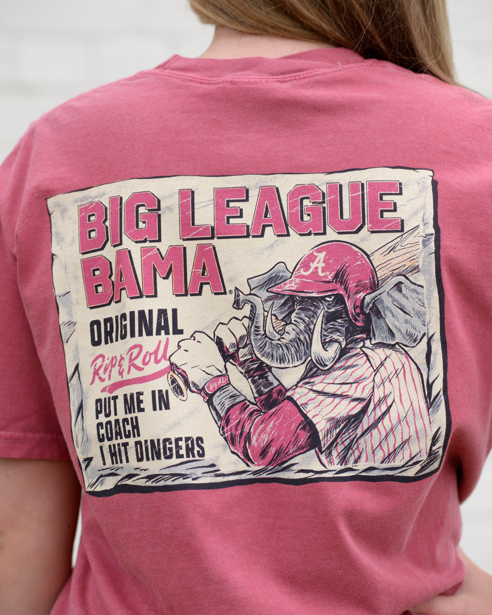 University of Alabama Red Comfort Colors T-Shirt with an image of Big Al in baseball gear swinging a bat below text "Big League Bama"