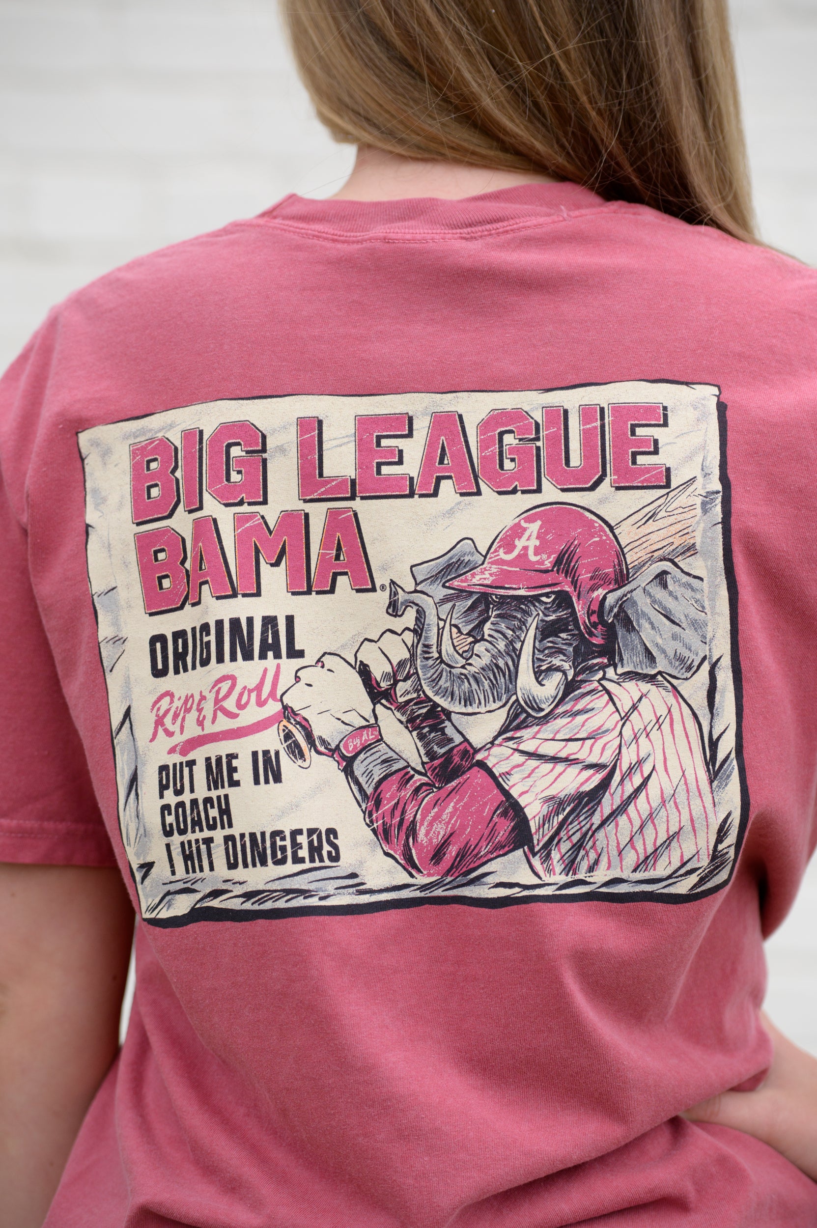 University of Alabama Red Comfort Colors T-Shirt with an image of Big Al in baseball gear swinging a bat below text "Big League Bama"