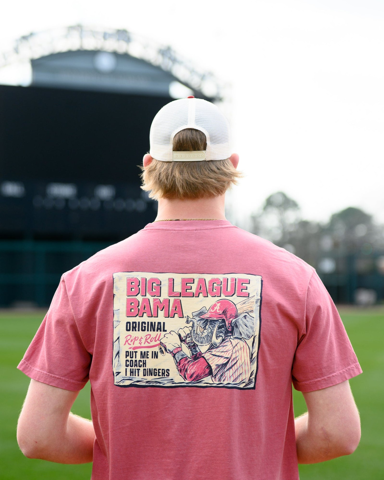 University of Alabama Red Comfort Colors T-Shirt with an image of Big Al in baseball gear swinging a bat below text "Big League Bama"