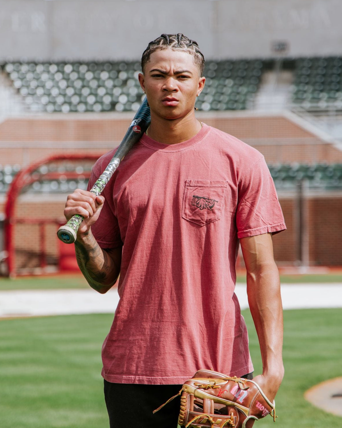 Front Pocket design featuring big al holding a baseball bat over his head