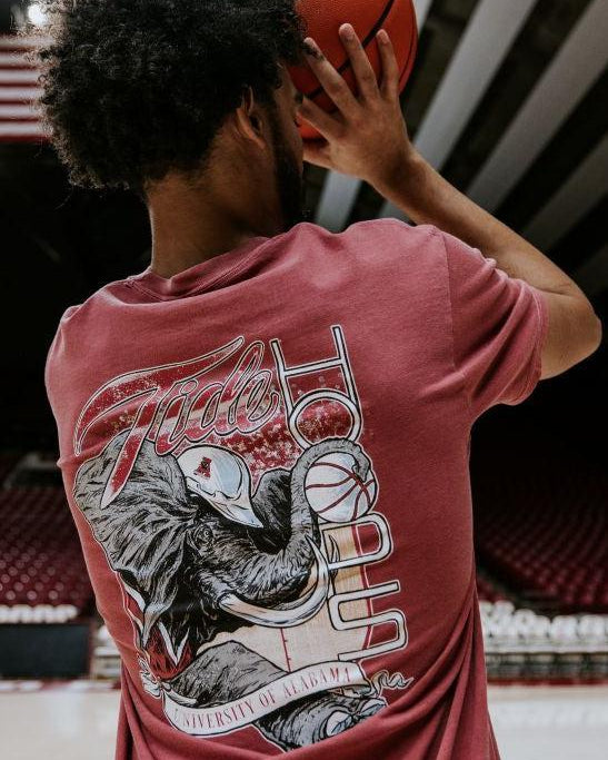 University of Alabama Red T-Shirt with Big Al wearing a hard hat and holding a basketball with his trunk to help spell the word “Hoops”