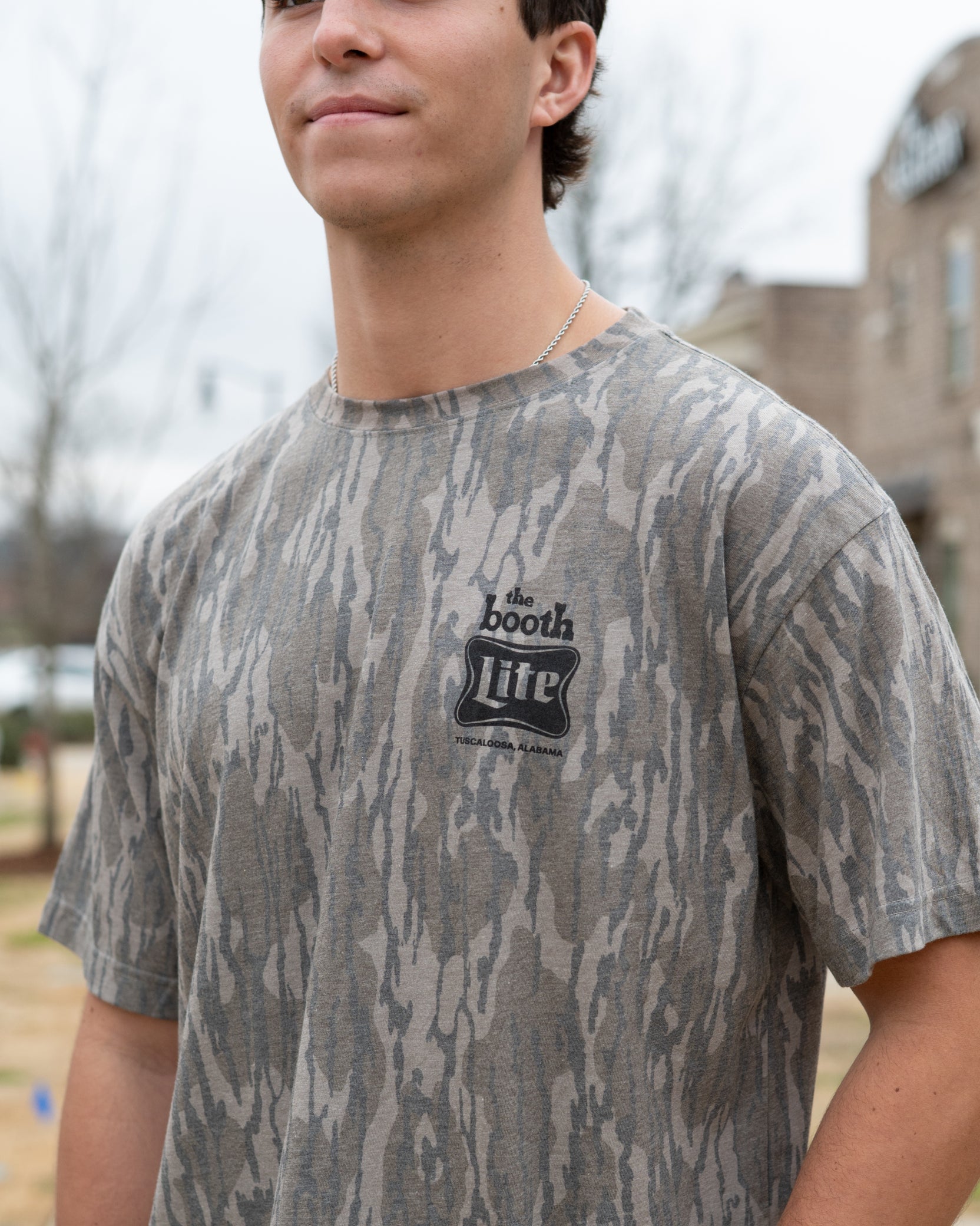 The Booth Camo T-Shirt with Black The Booth Logo on the Chest and the Back