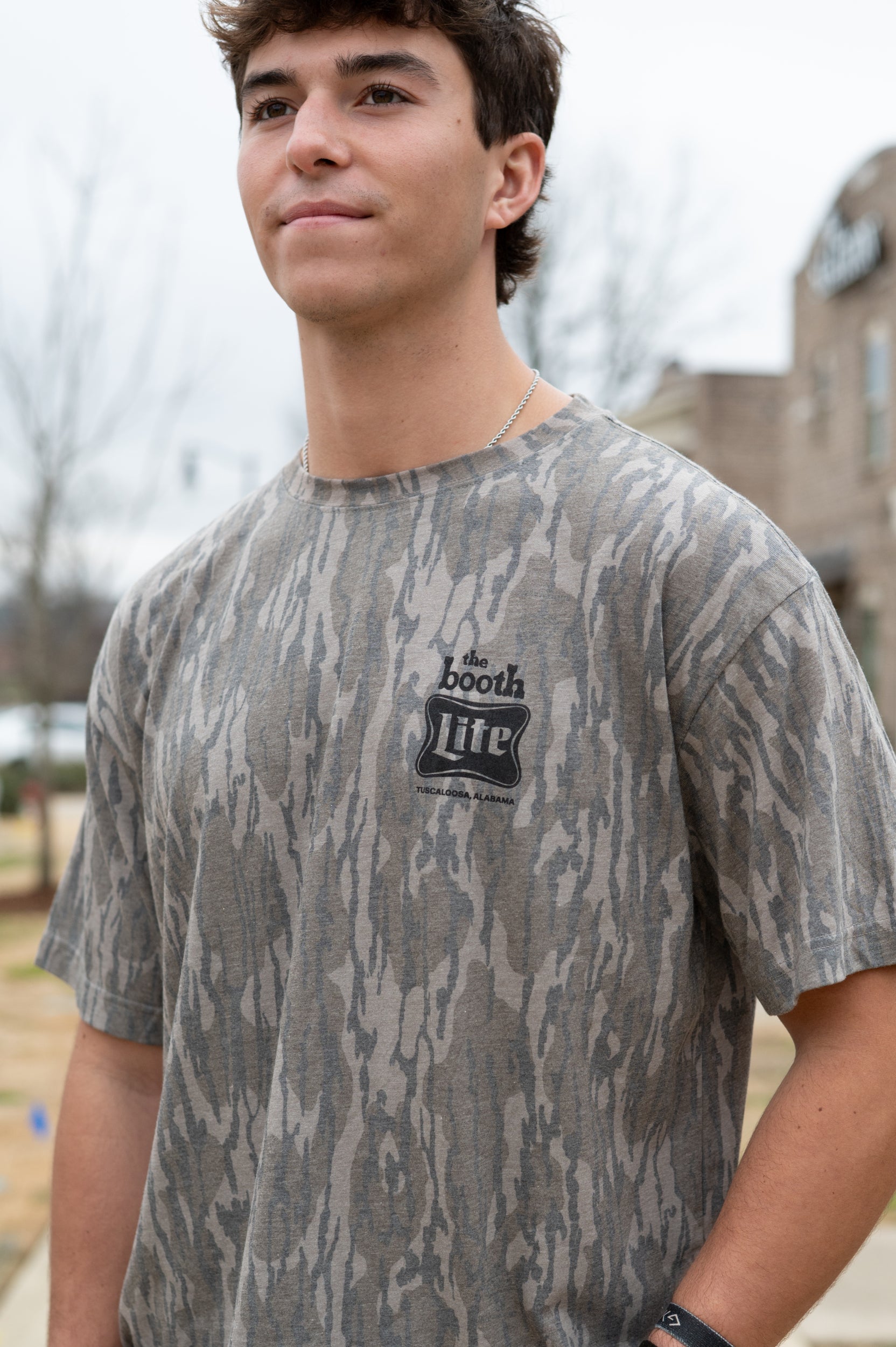 The Booth Camo T-Shirt with Black The Booth Logo on the Chest and the Back