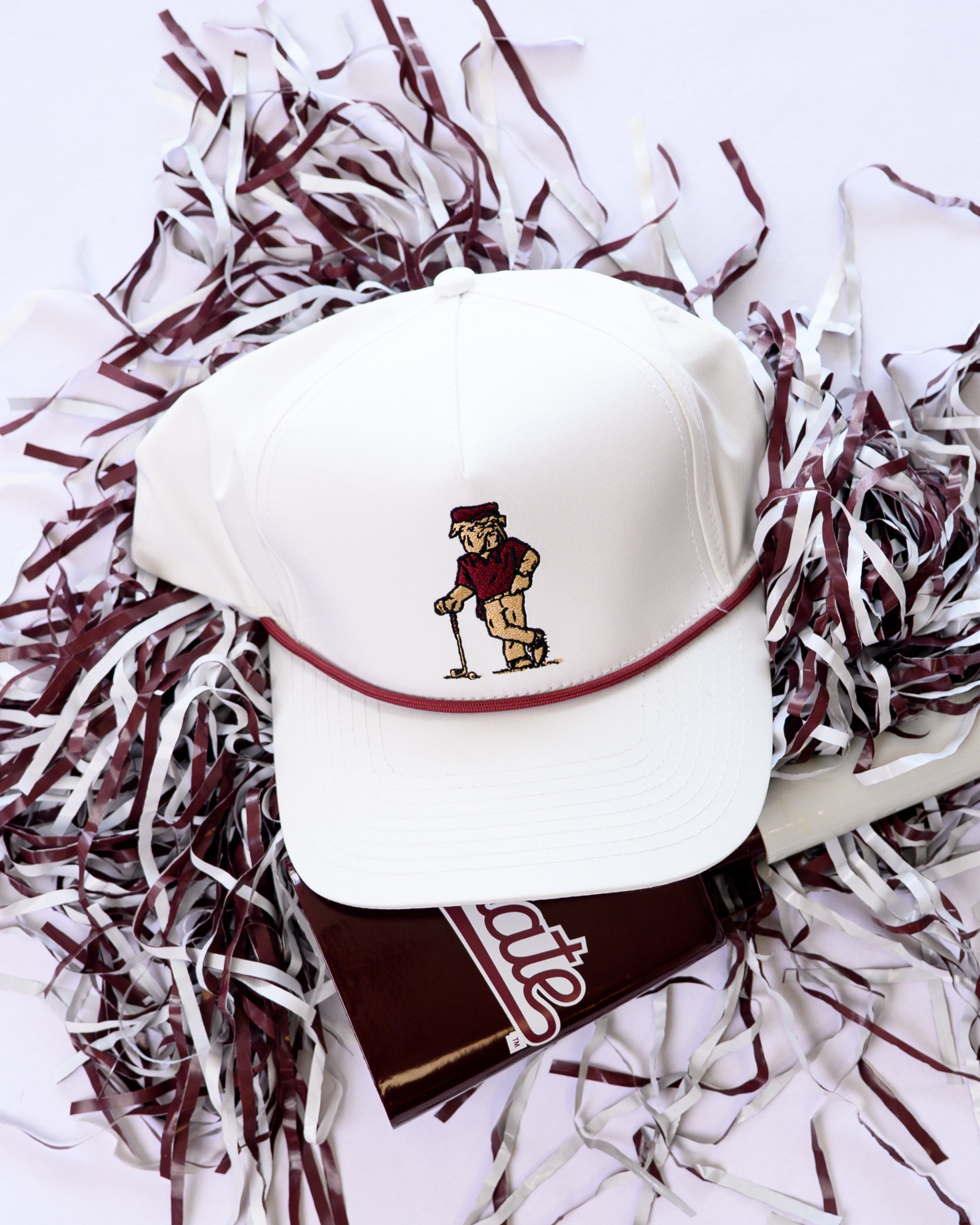 Mississippi State White Hat with an image of Bully leaning against a golf club