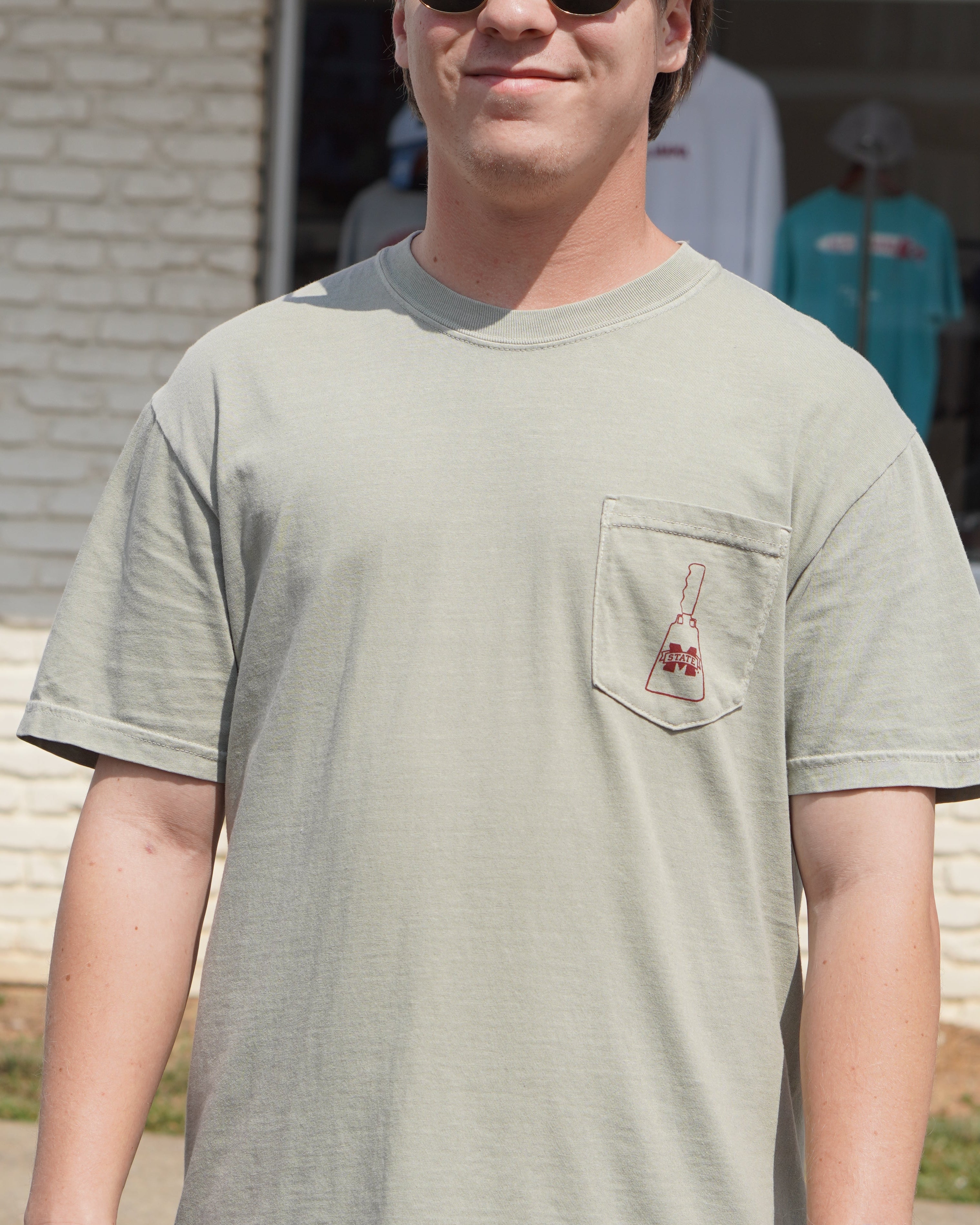 front pocket with an MSU cowbell logo