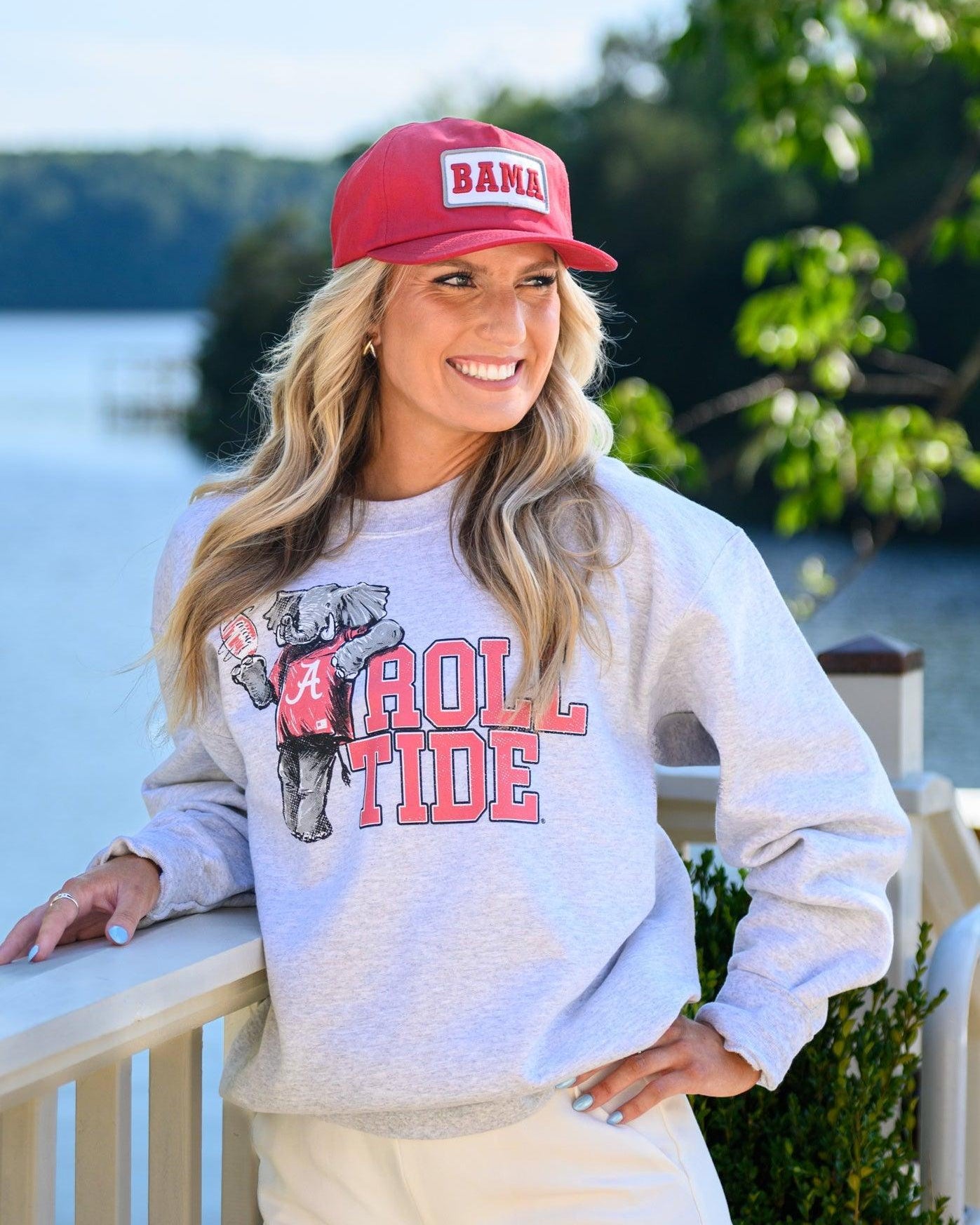 University of Alabama Gray Chill Big Al Sweatshirt with Red text "Roll Tide" and a graphic of Big Al leaning against the "R" of "Roll"
