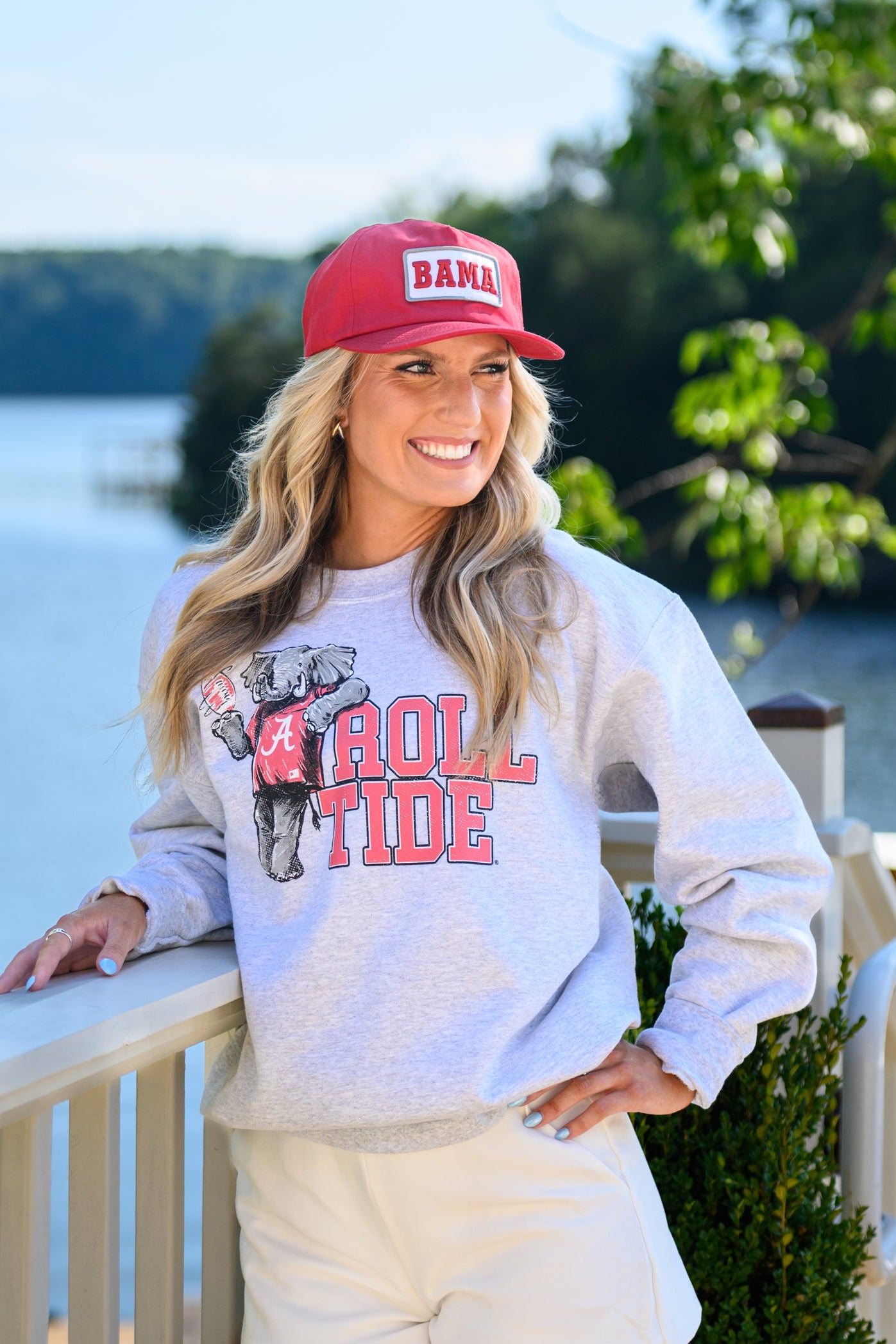 University of Alabama Gray Chill Big Al Sweatshirt with Red text "Roll Tide" and a graphic of Big Al leaning against the "R" of "Roll"
